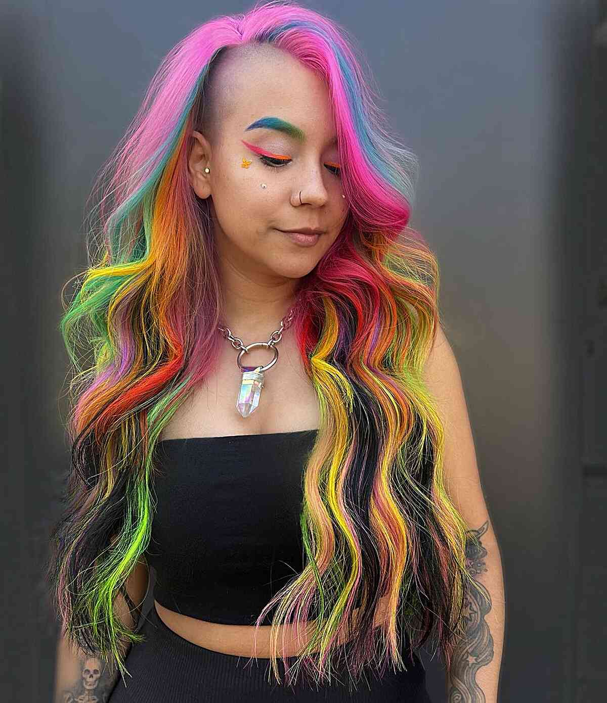 Flawless Rainbow Hair with perfectly placed colors for ladies with long hair