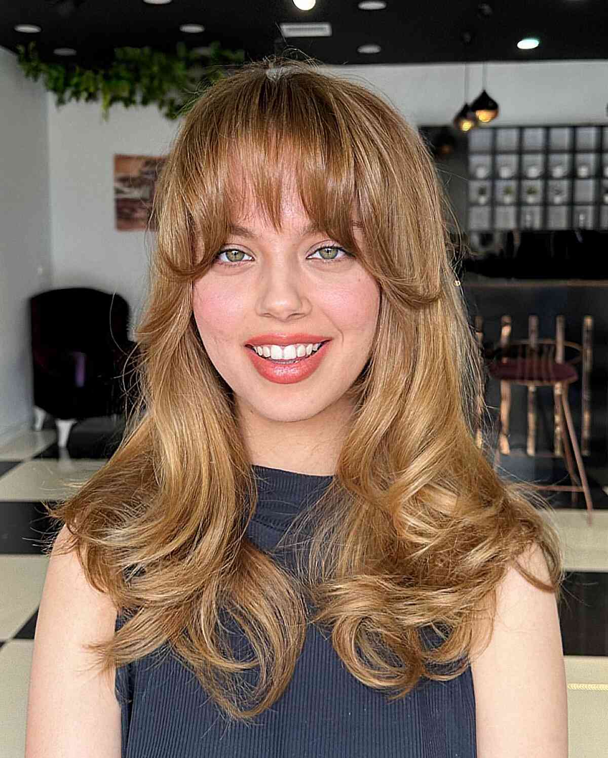 Flowy waterfall Bangs and Curled Ends for Medium hair