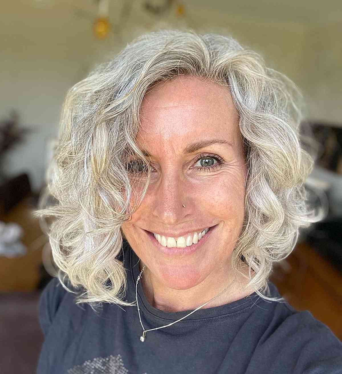 Fluffy Chin-Length Curly Bob for Women Over 50