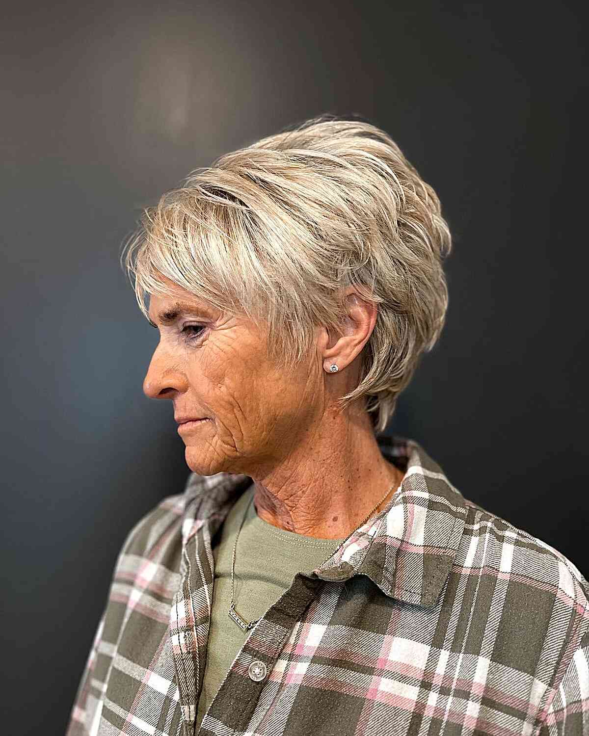 Fluffy Choppy Pixie with Feathered Layers on Women Aged 70