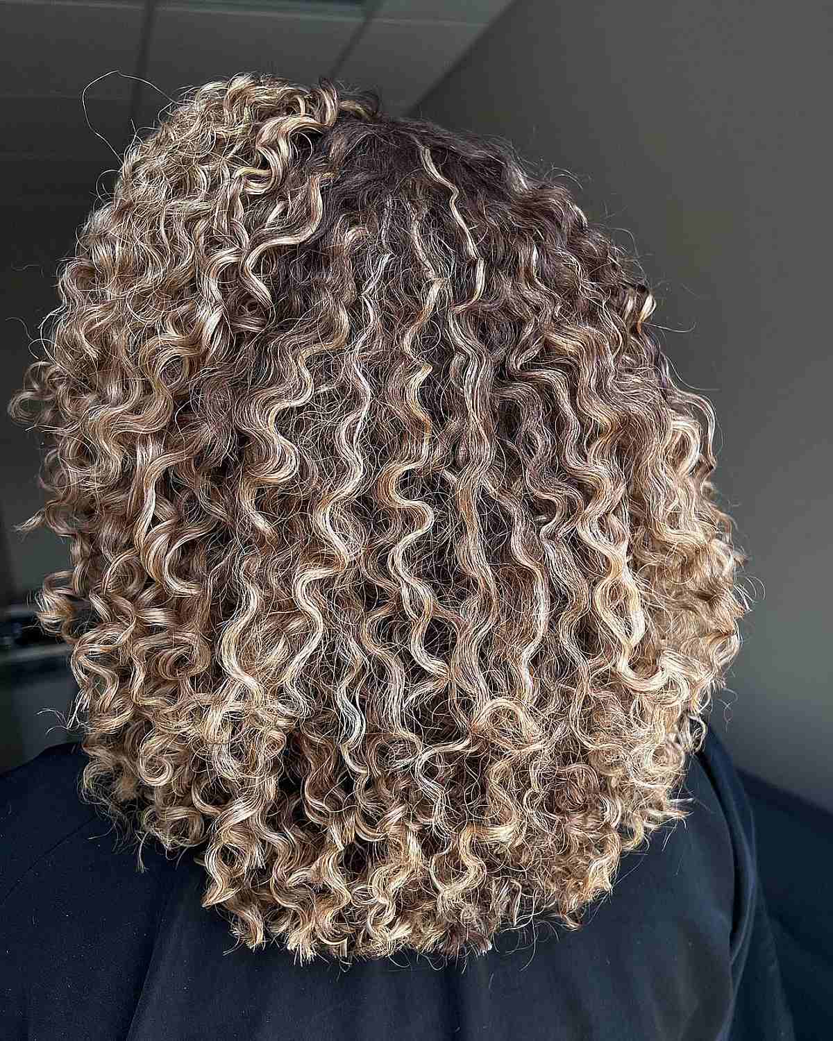 Fluffy Curls with Ash Blonde Balayage Highlights