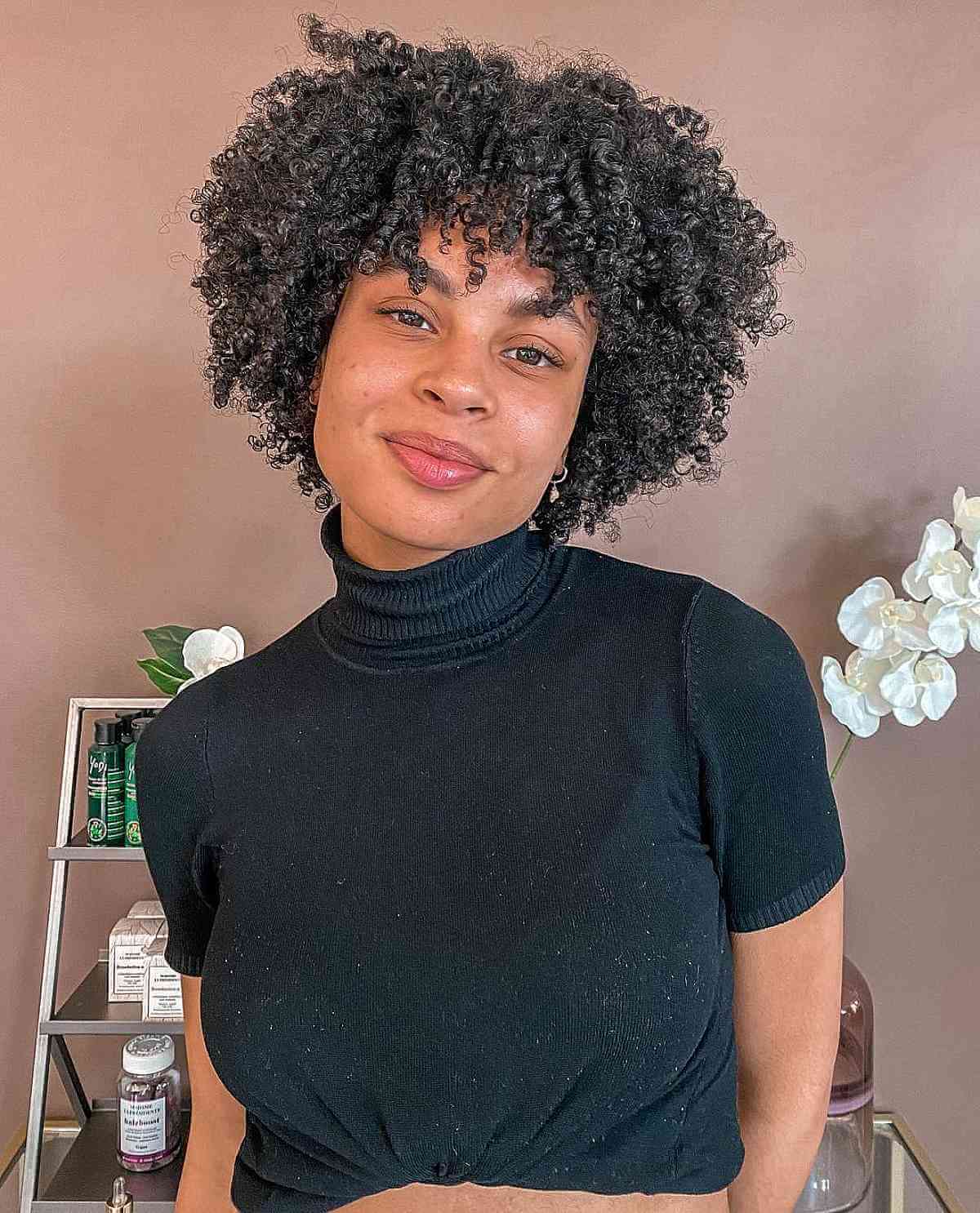 Fluffy Short Layered Cut with Bangs for Kinky Black Hair