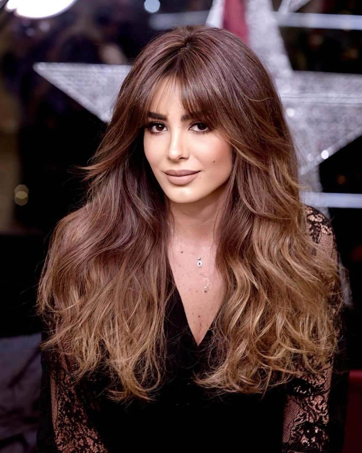 Free-Flowing Long Hair with Long Bangs for Square Face Shapes