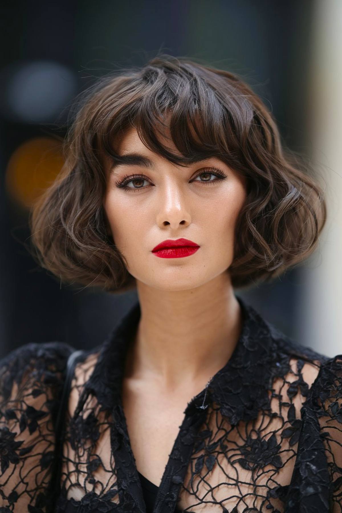 Classic French bob style haircut with soft waves