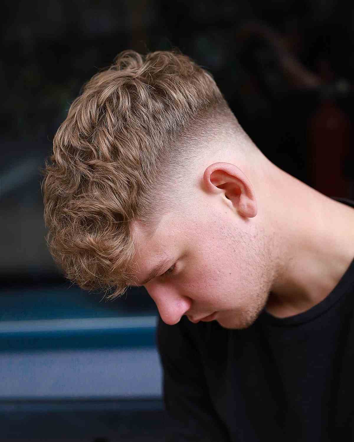 Fresh Blonde Waves with a High Fade