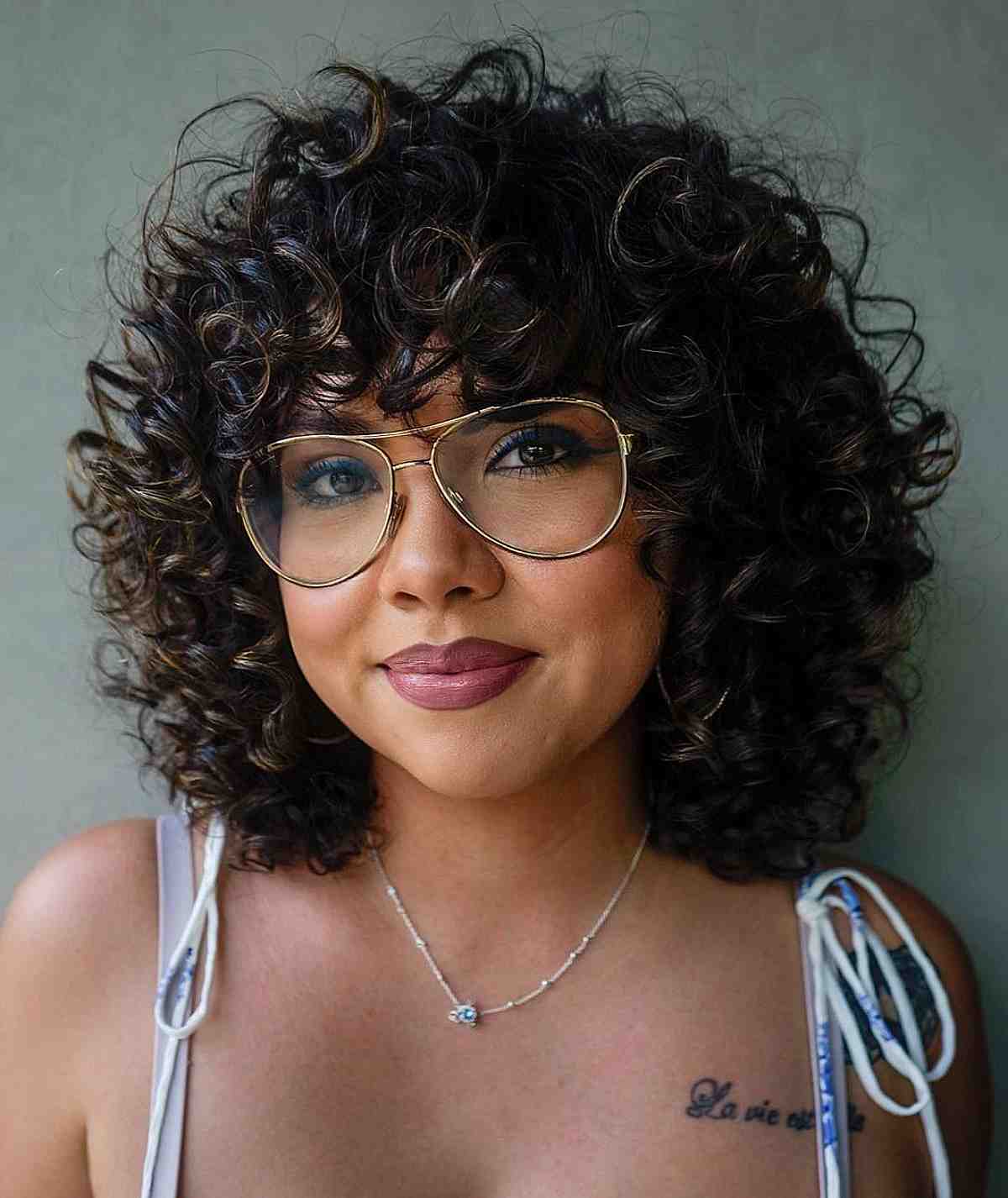 Fresh Bobbed Curls and Bangs with Glasses