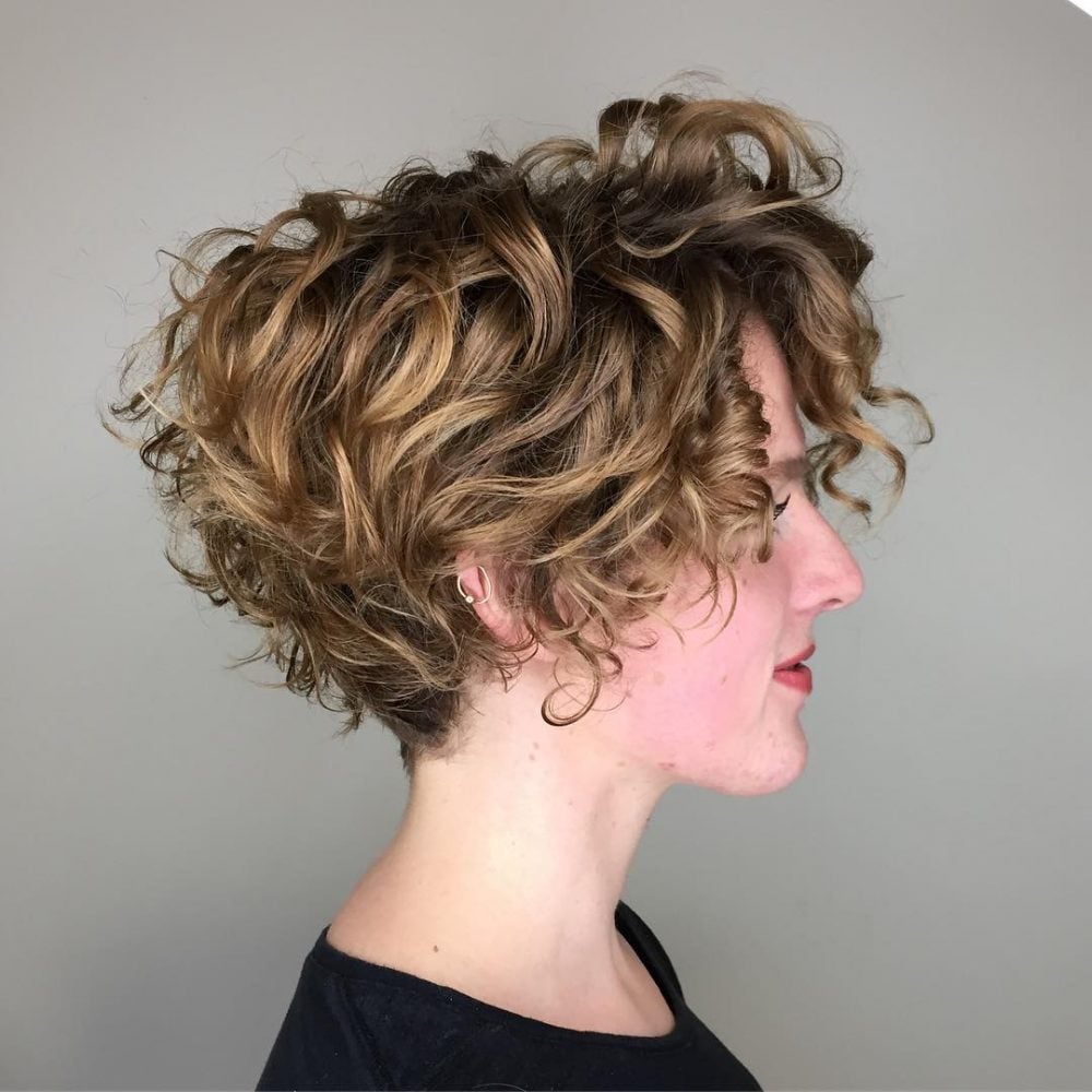 A messy fresh curly stacked bob