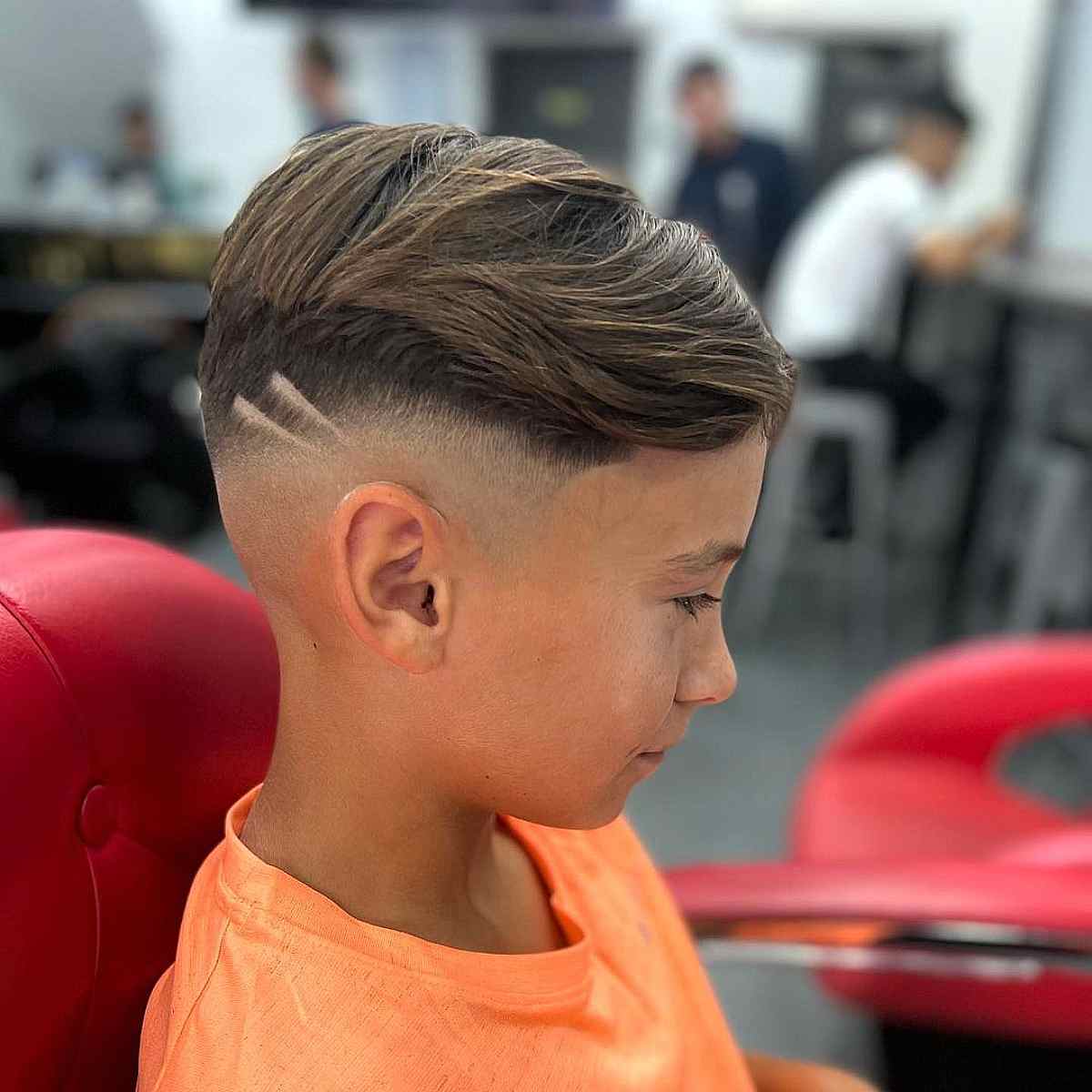 Cute European Boy Getting Hairstyle, Hairdresser Makes a Hairstyle for a Boy .Side View Stock Photo - Image of barber, salon: 223783518