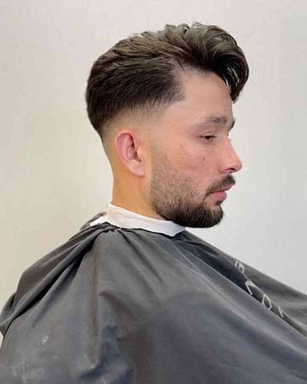 Fresh Mid Fade With A Long Top For Men 600x750 