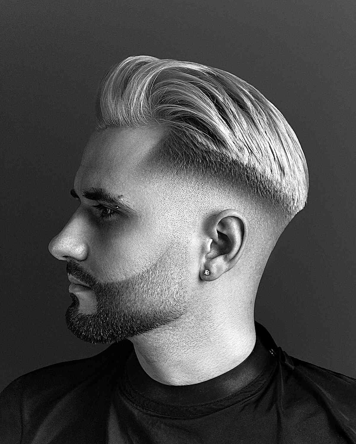 Fresh Slick Back with a Beard Fade for Men with very short sides and length on top
