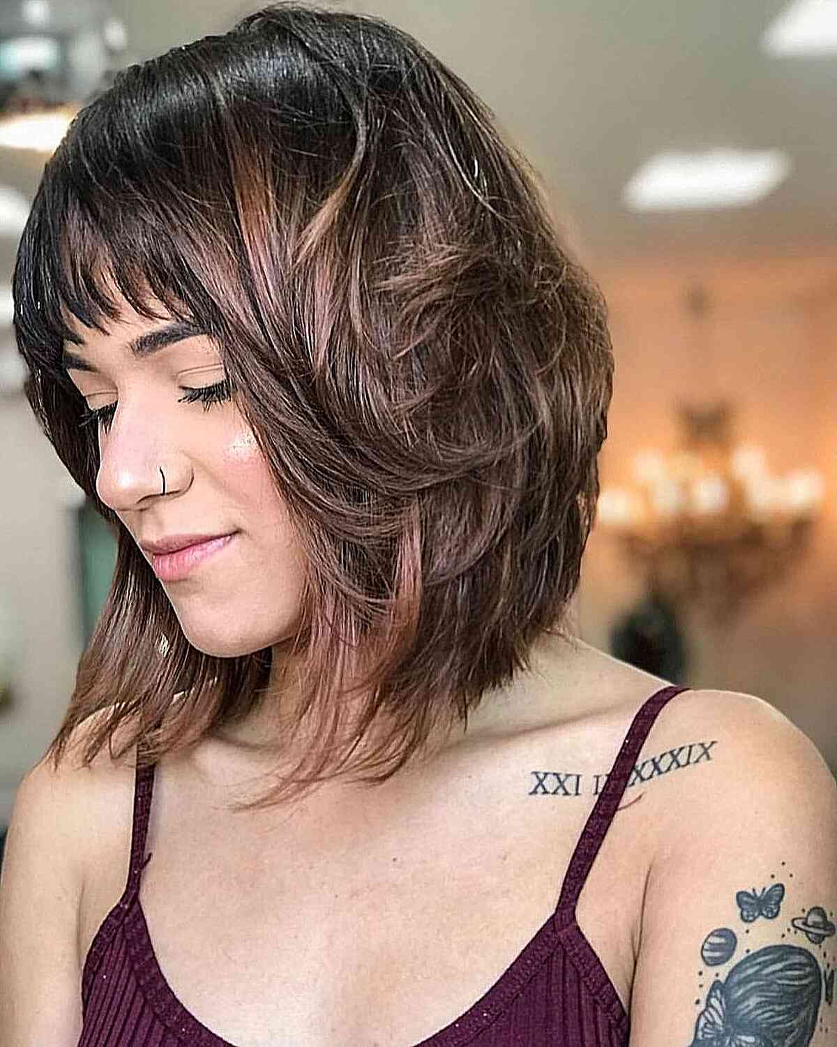 Freshly Layered Shoulder-Length Bob Cut with Fringe and highlights