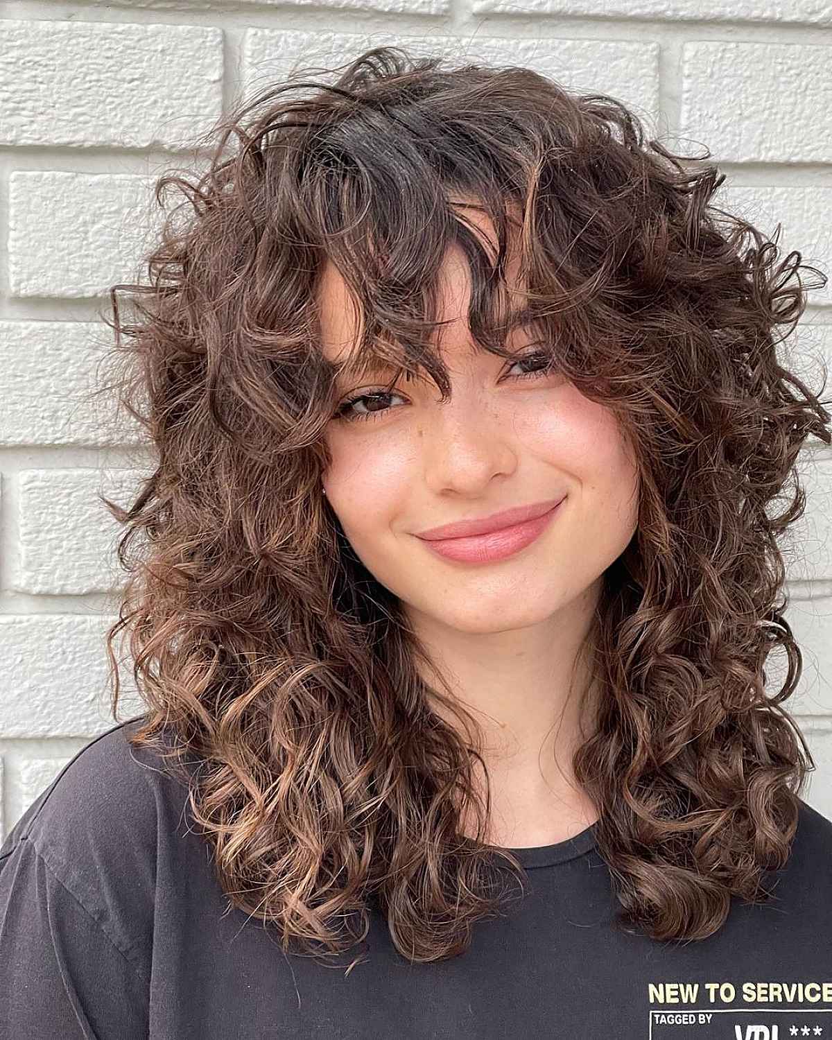 Fringe for women with curly hair and a square face
