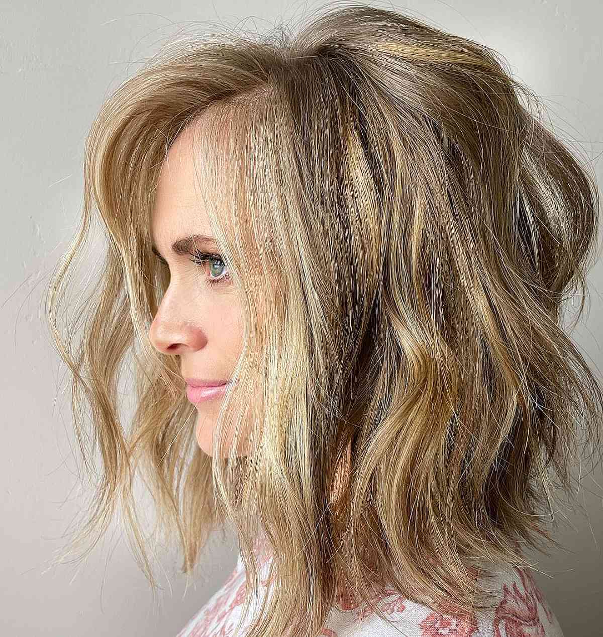 Frizzy waves shoulder length hairstyle