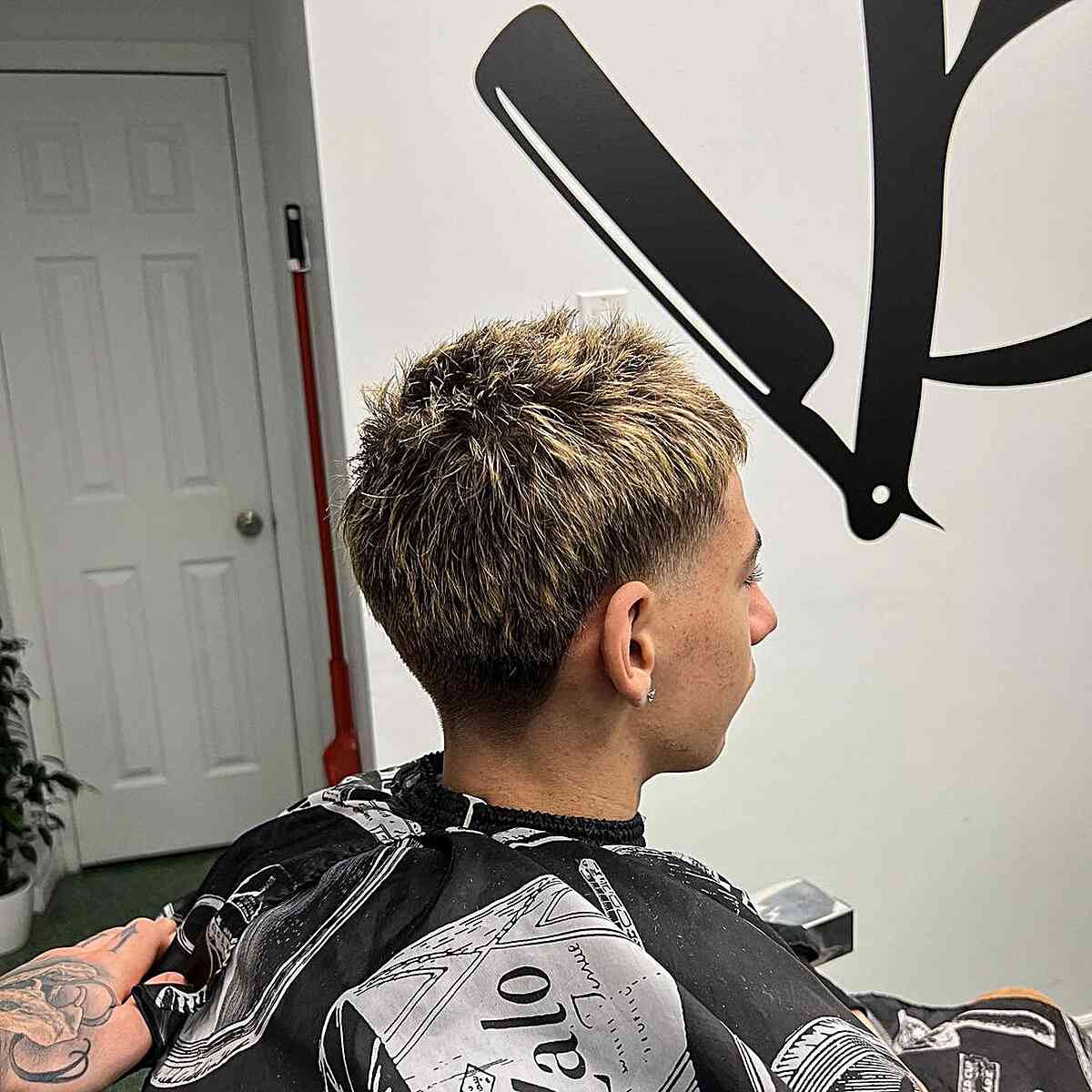 Frosted Blonde Accents on Guys' Taper Fade Cut