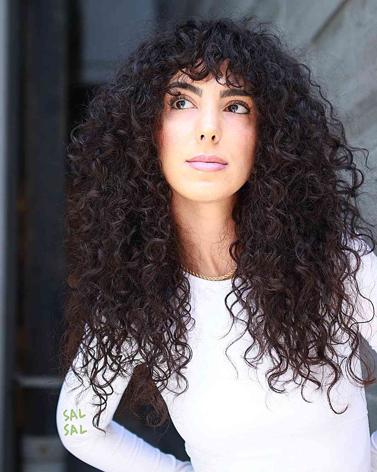 Full and Healthy Long Curls and Bangs for ladies with thick curly hair