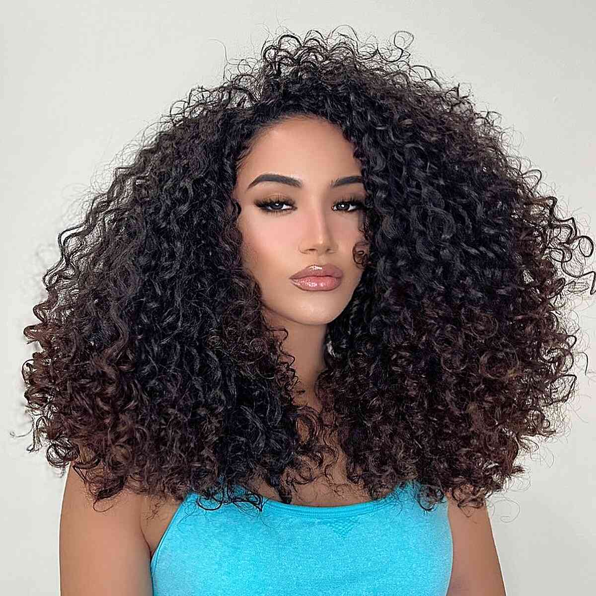 Full and Voluminous Rezo Cut Curls for African-American Women with Long Curly Hair