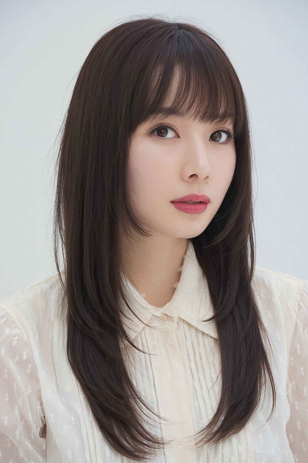 Long hair paired with full bangs for japanese women