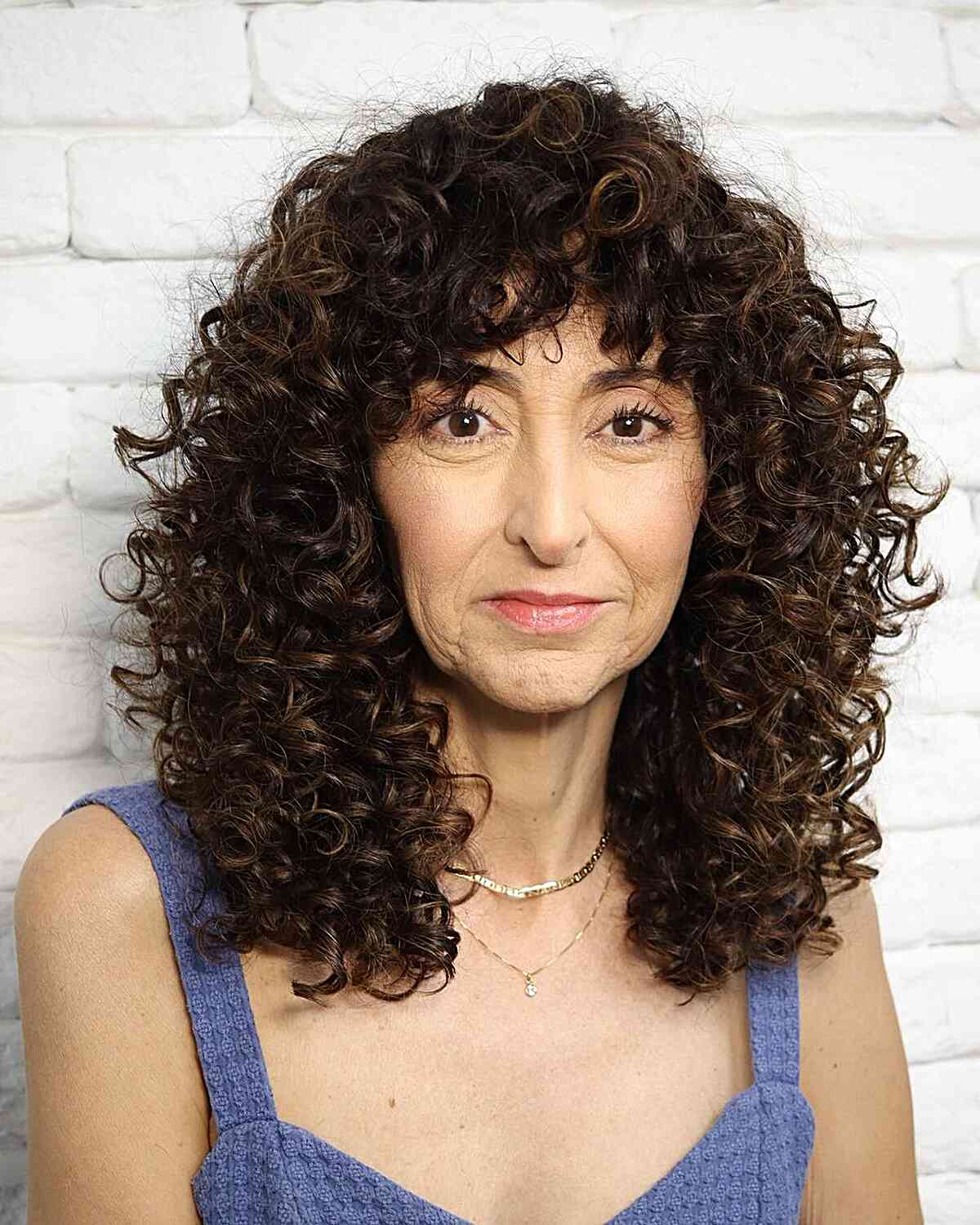Full Curls at Collarbone Length for 60-Year-olds
