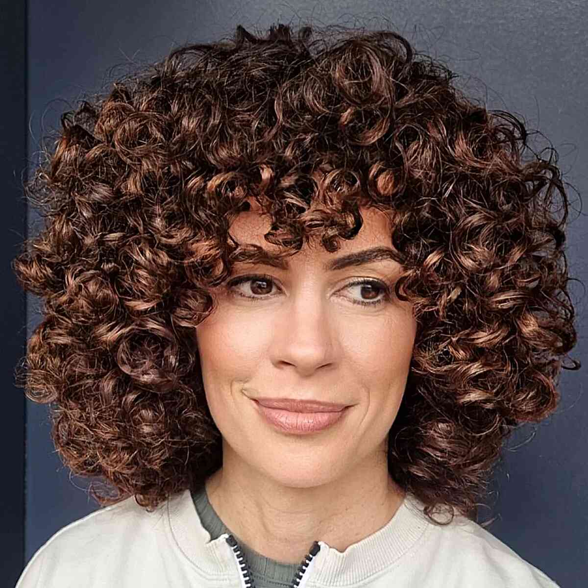 Fun Short Curls with Bangs for girls with naturally curly hair