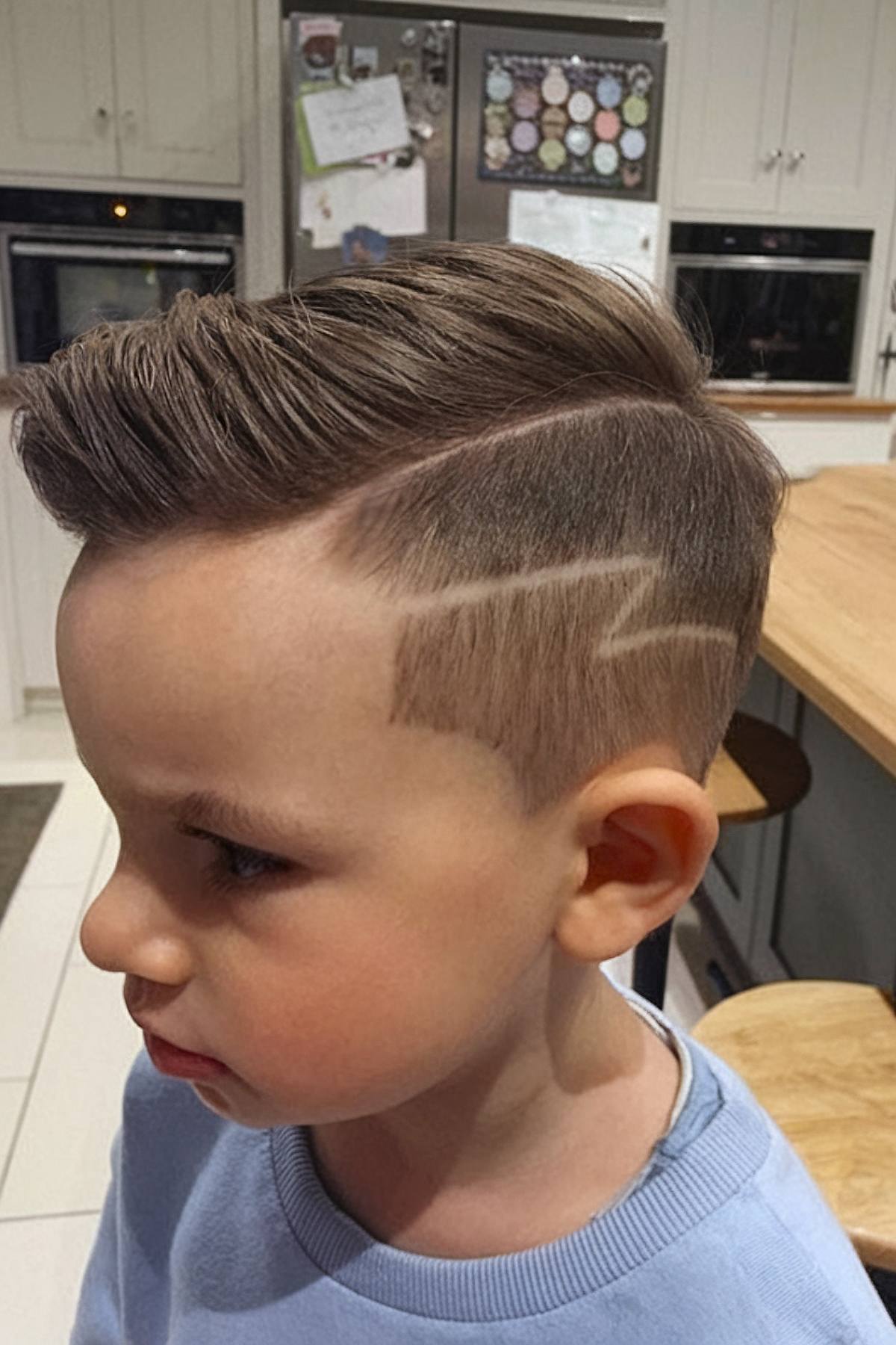 Toddler boy haircut with zig-zag design on the sides