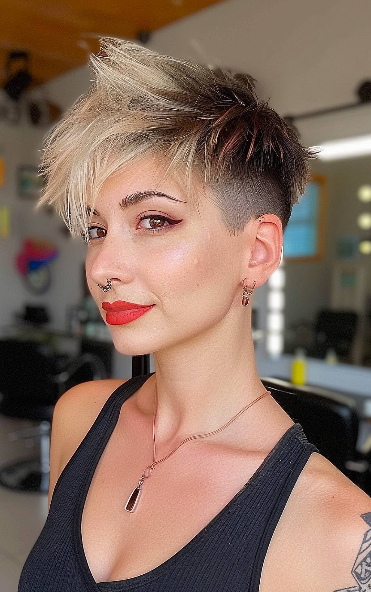 Funky pixie haircut with punk-style spikes and shaved sides for thick hair