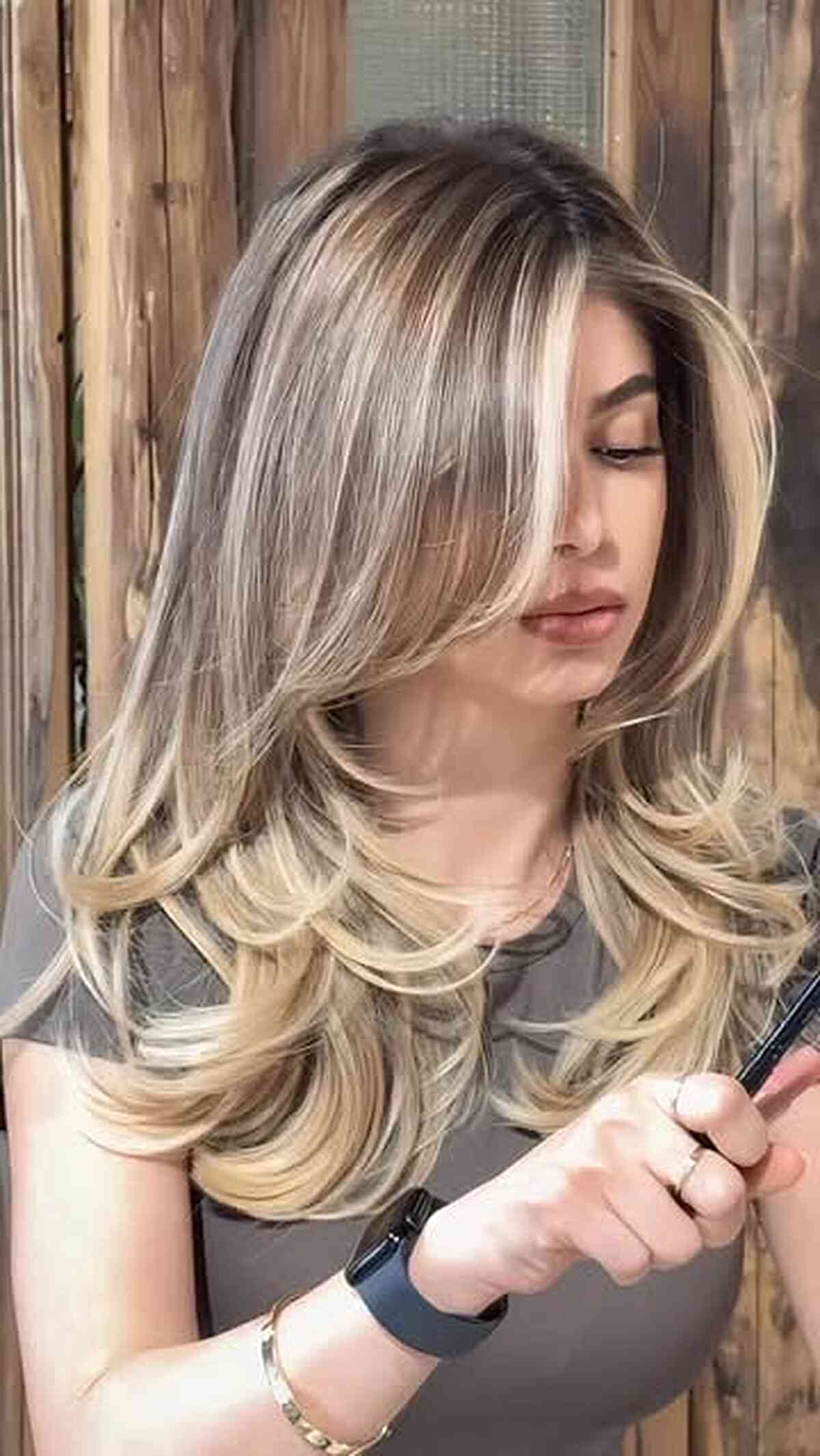 Soft Cascading Layers with Blonde Highlights