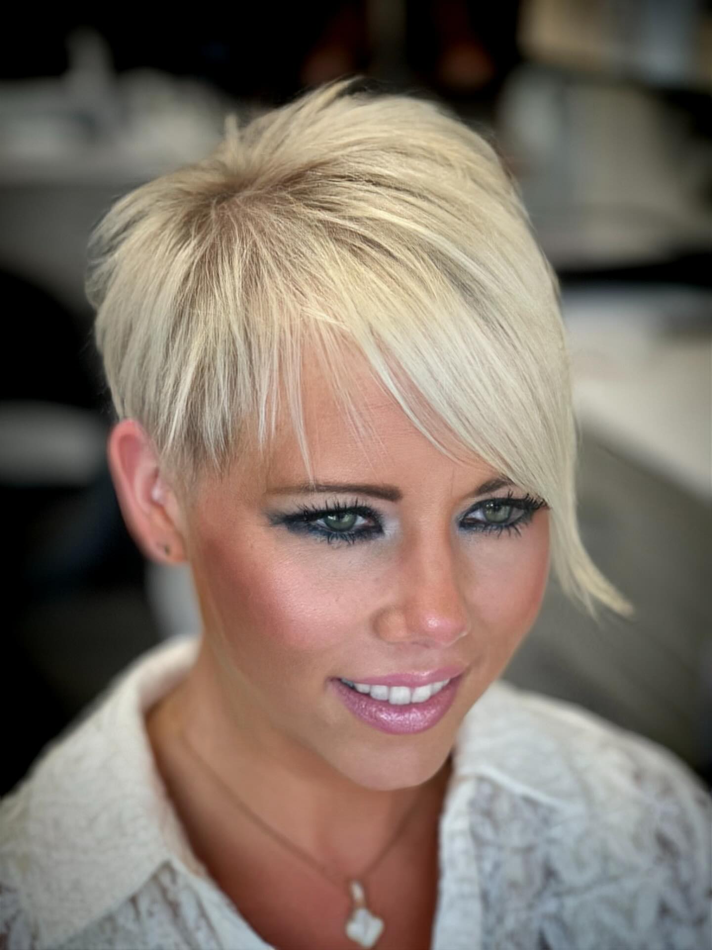 Platinum Blonde Asymmetrical Pixie with Textured Layers