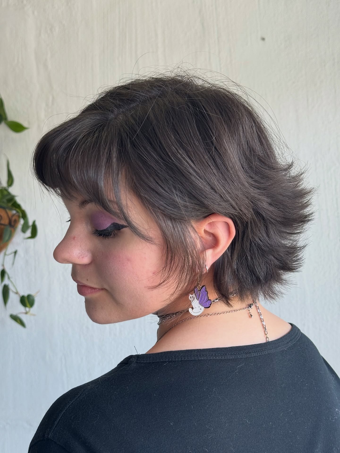 Textured Dark Brunette Pixie with Sweeping Bangs