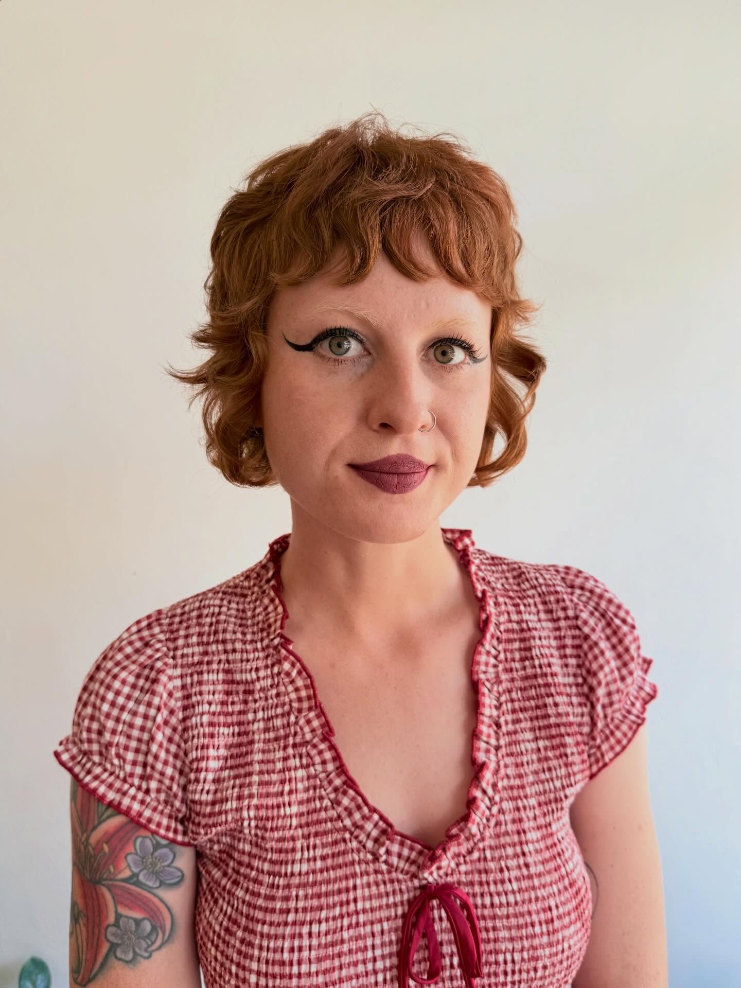 Vibrant Copper Curled Bob with Defined Waves