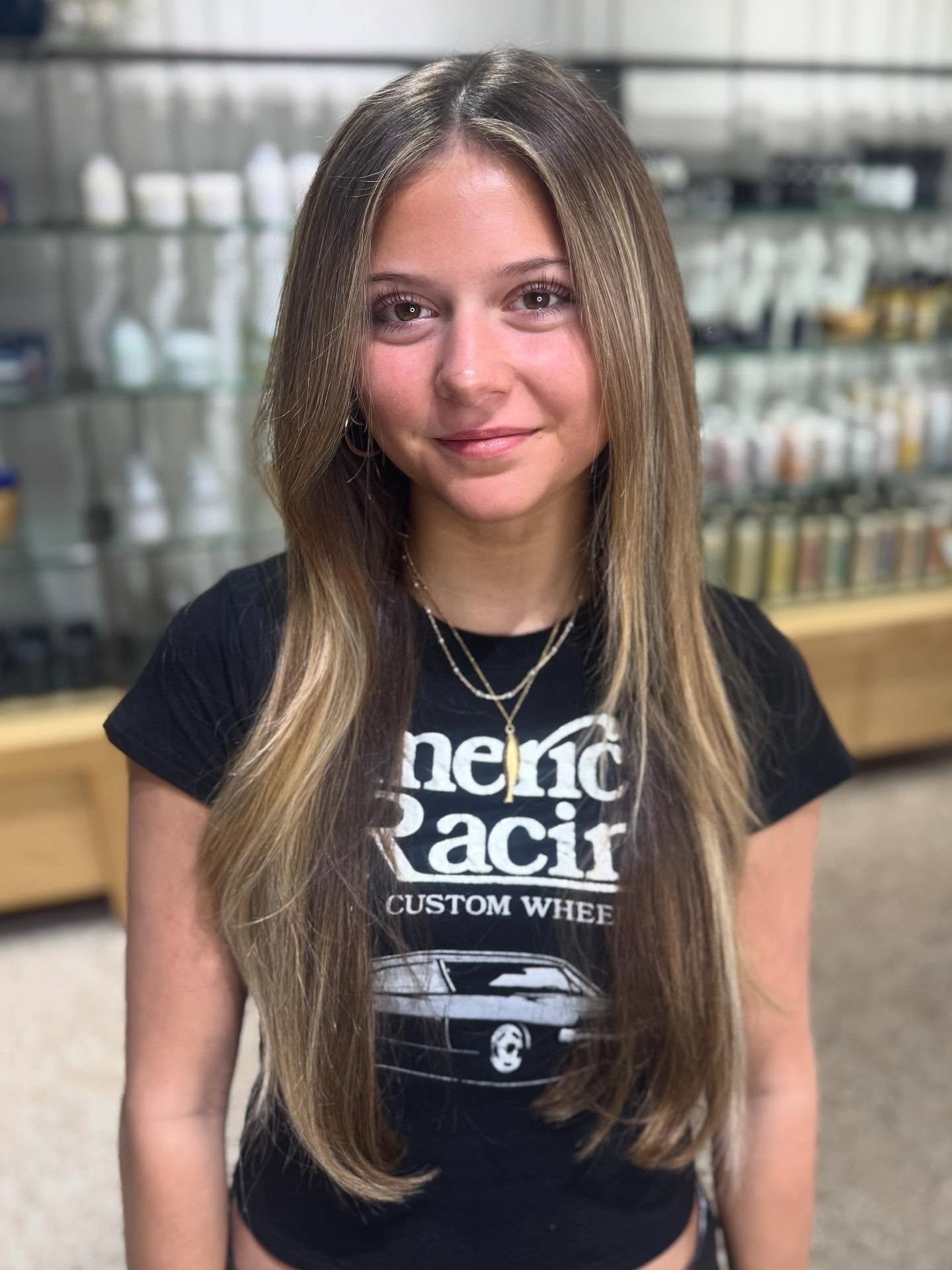 Long Glossy Straight Hair with Subtle Highlights