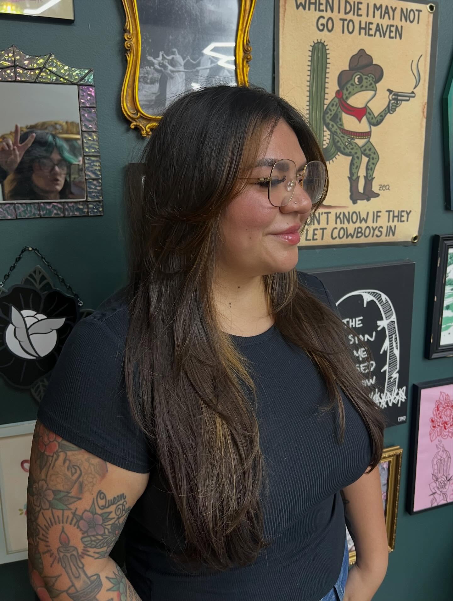 Long, Softly Layered Hair with Subtle Highlights