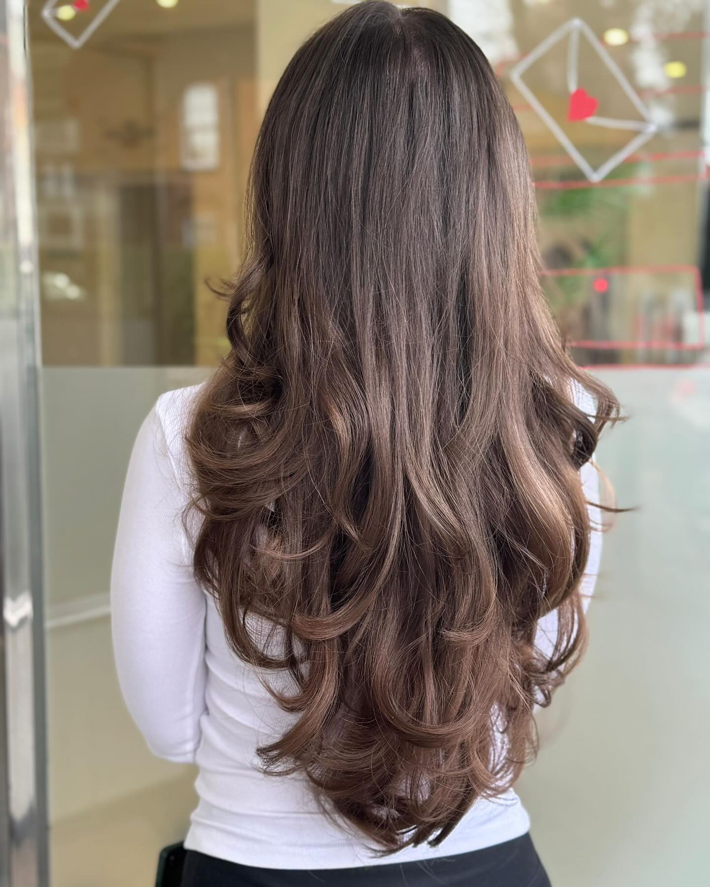 Radiant Long Voluminous Curls with Soft Definition