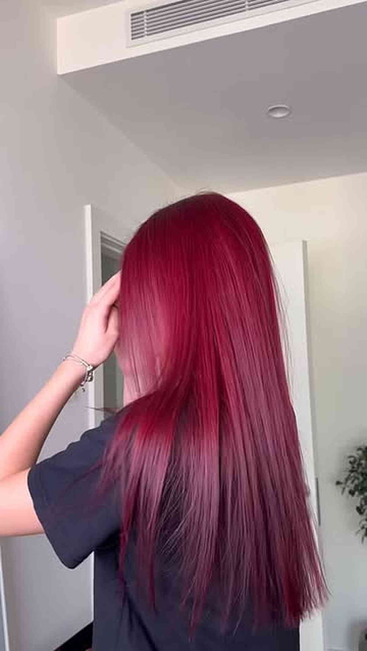 Vibrant Straight Red Hair with Subtle Dimension
