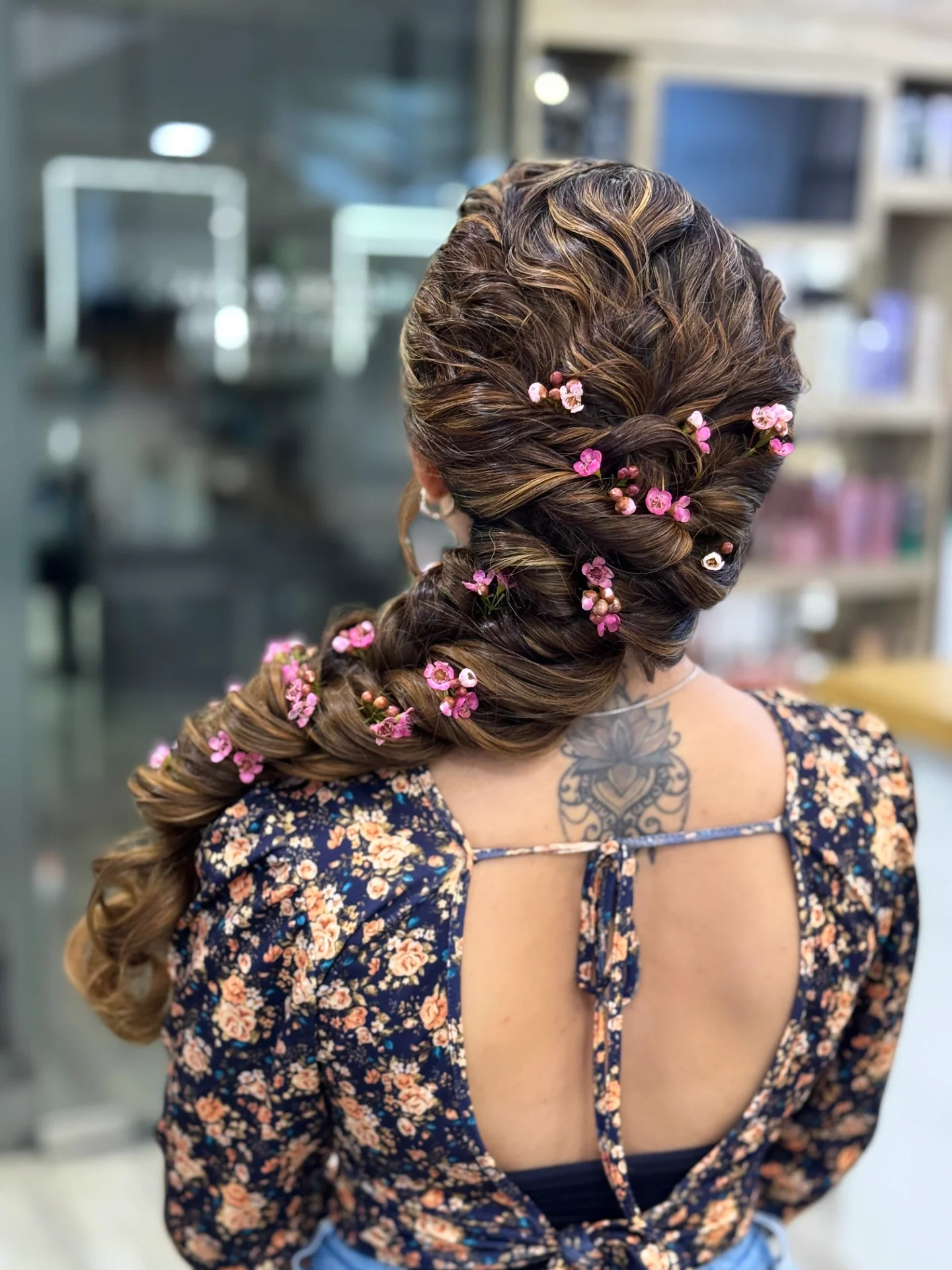 Charming Long Twisted Braid with Floral Accents