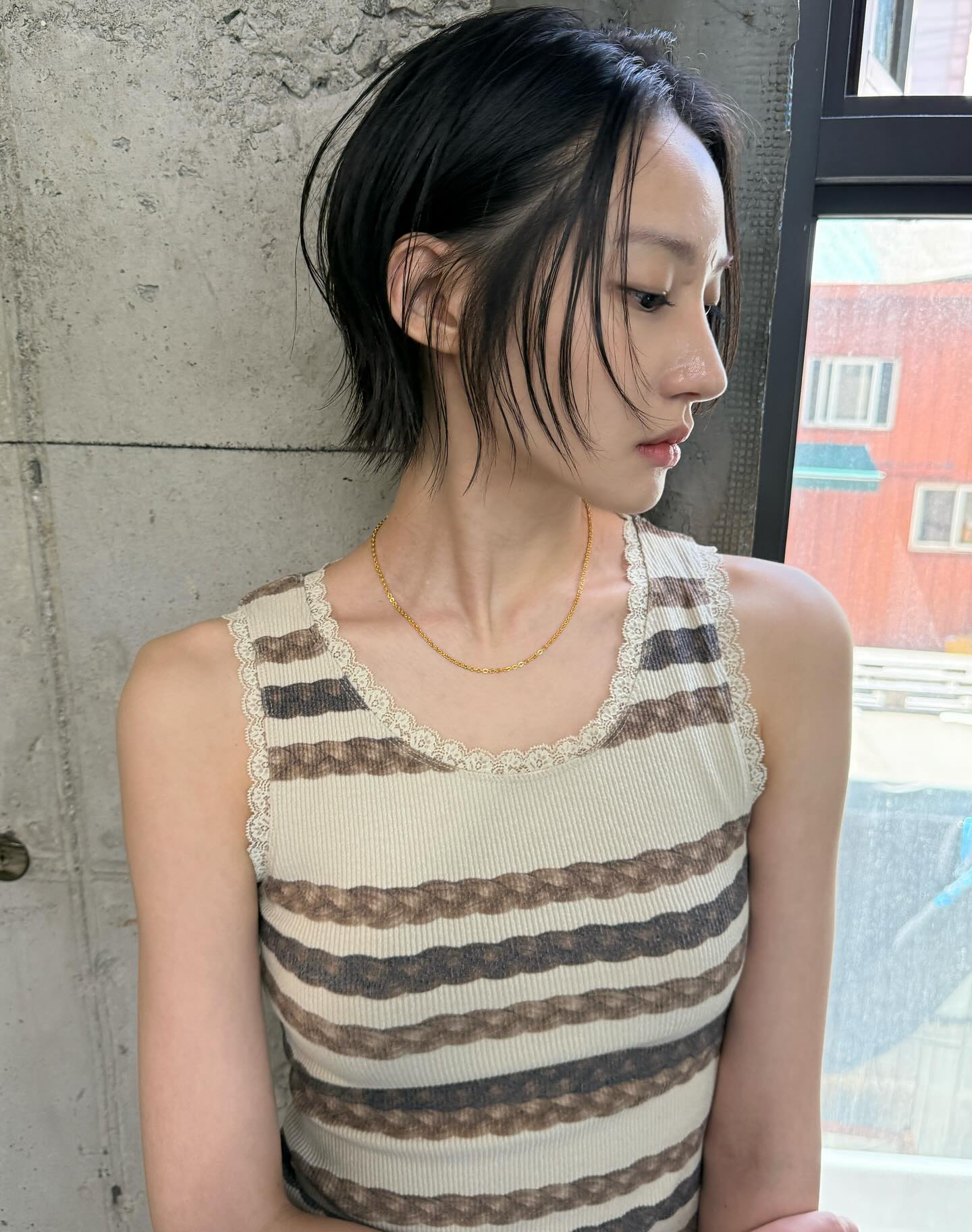 Edgy Black Layered Bob with a Side Sweep