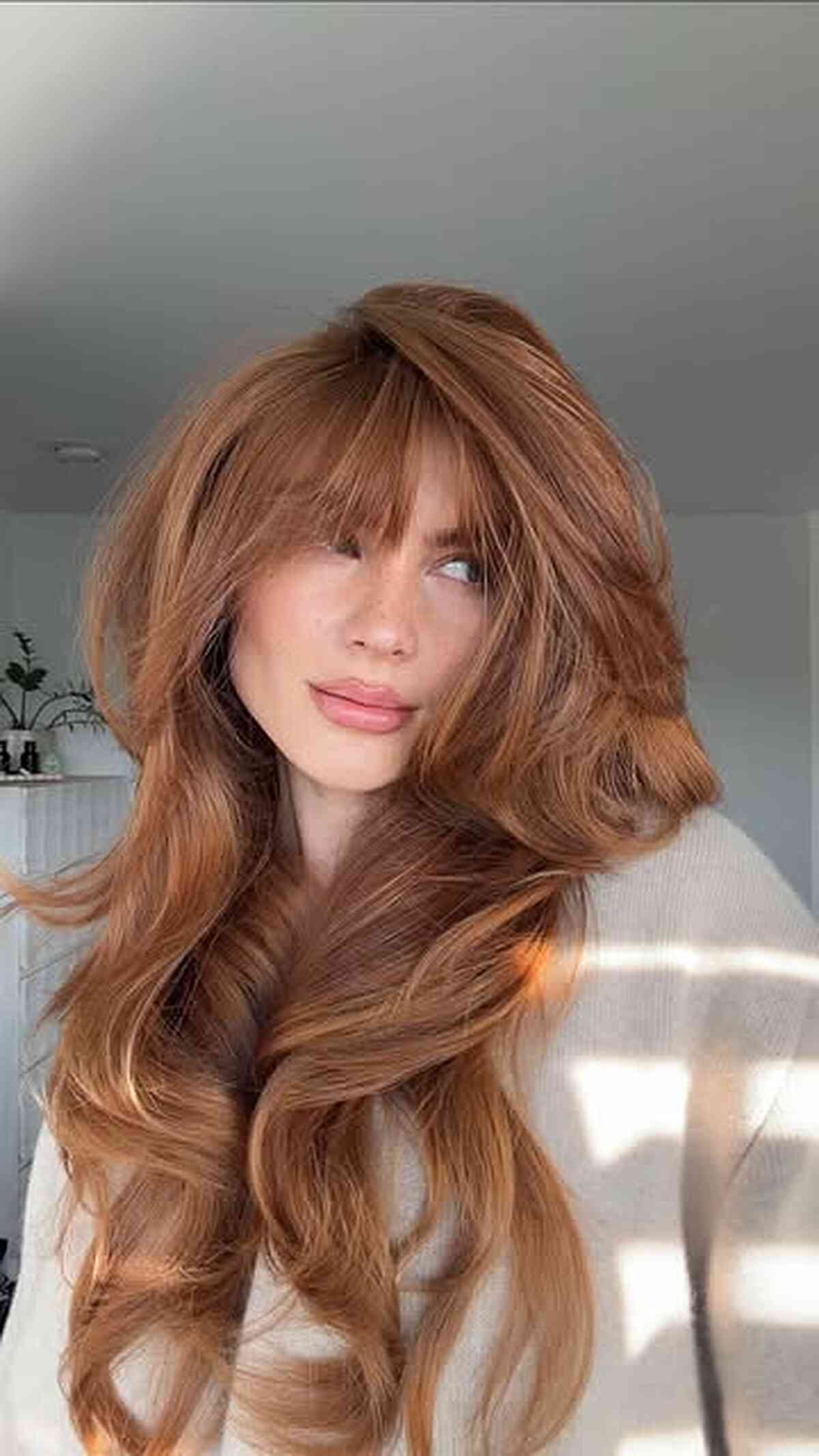 Long Copper Layers with Curtain Bangs