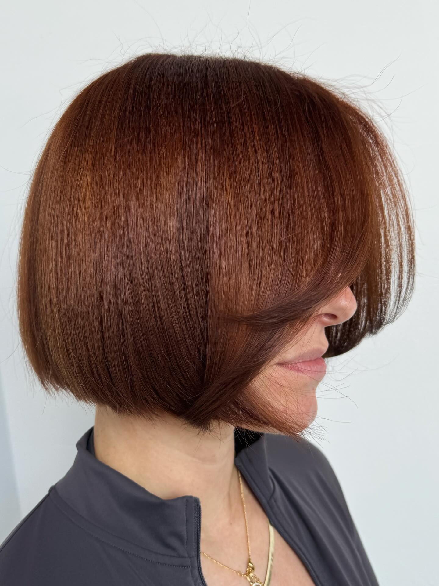 Rich Auburn Bob with Subtle Layers