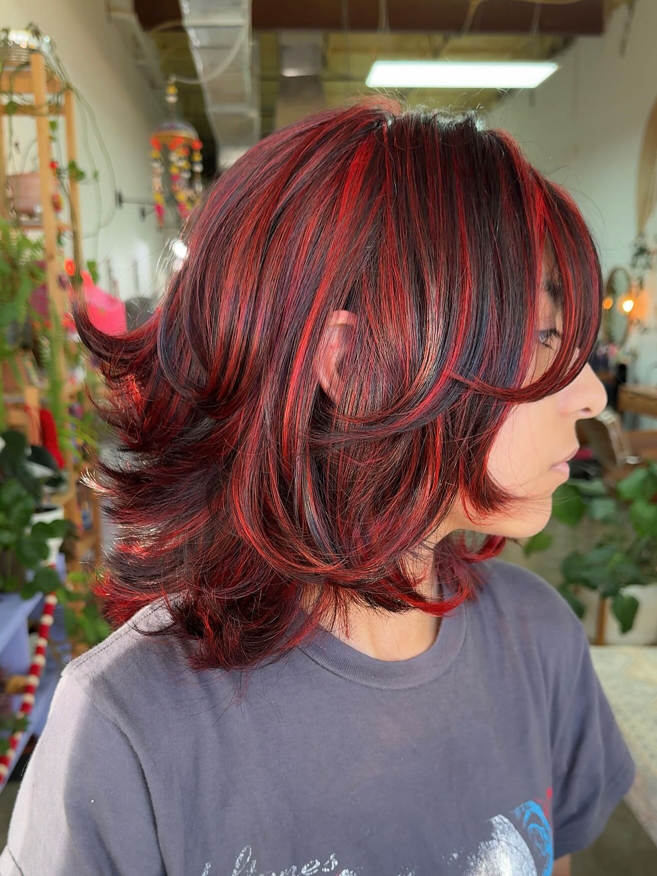 Stylish Layered Cut with Bold Red Highlights