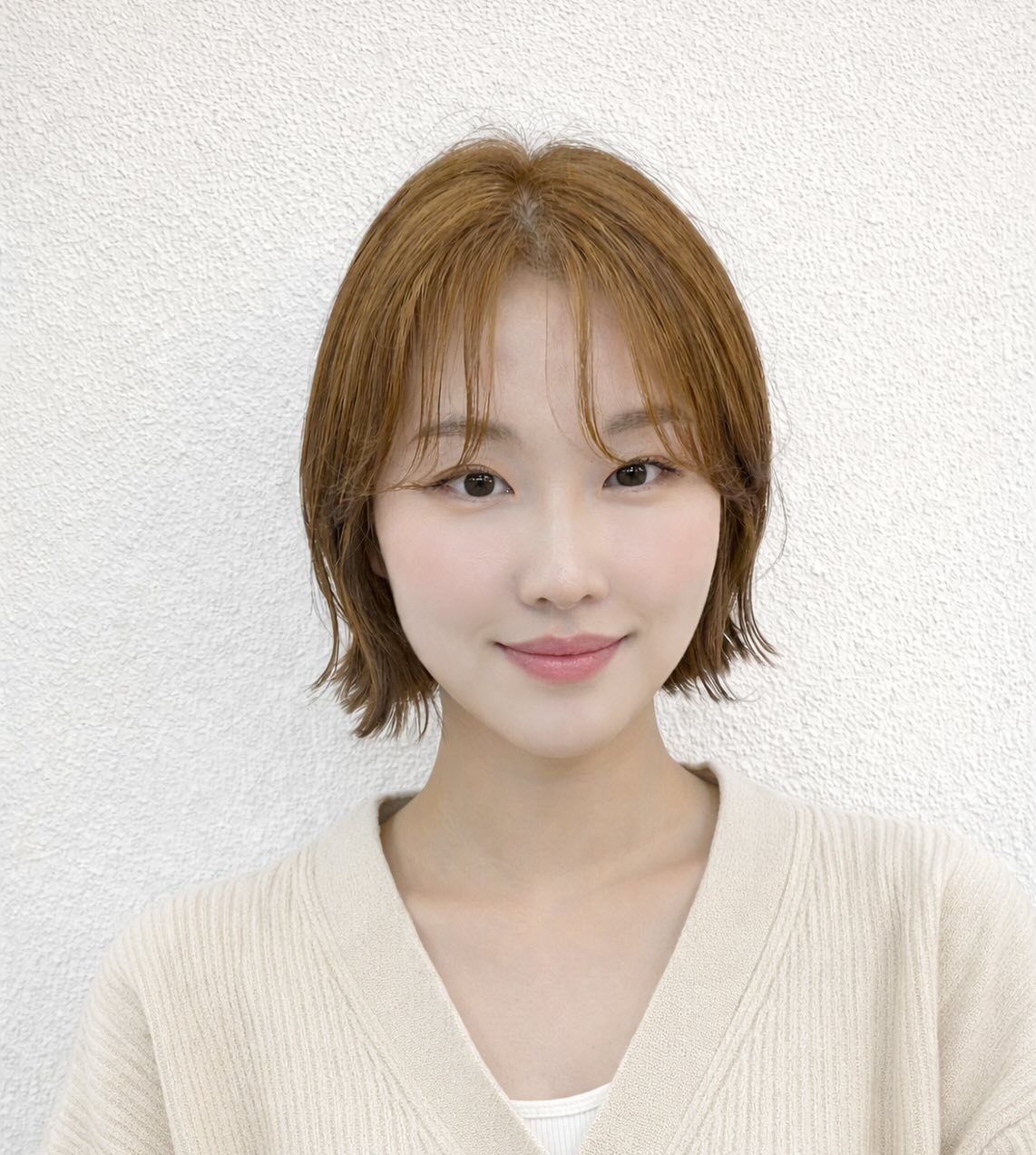 Textured Chestnut Bob with Curved Bangs