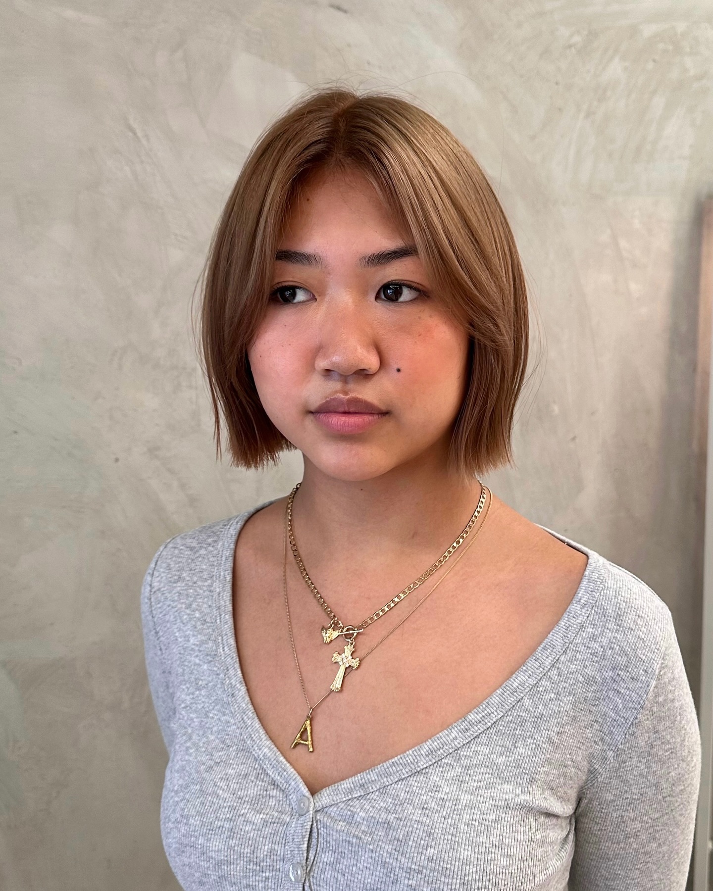 Warm Blonde Textured Lob with Face-Framing Layers