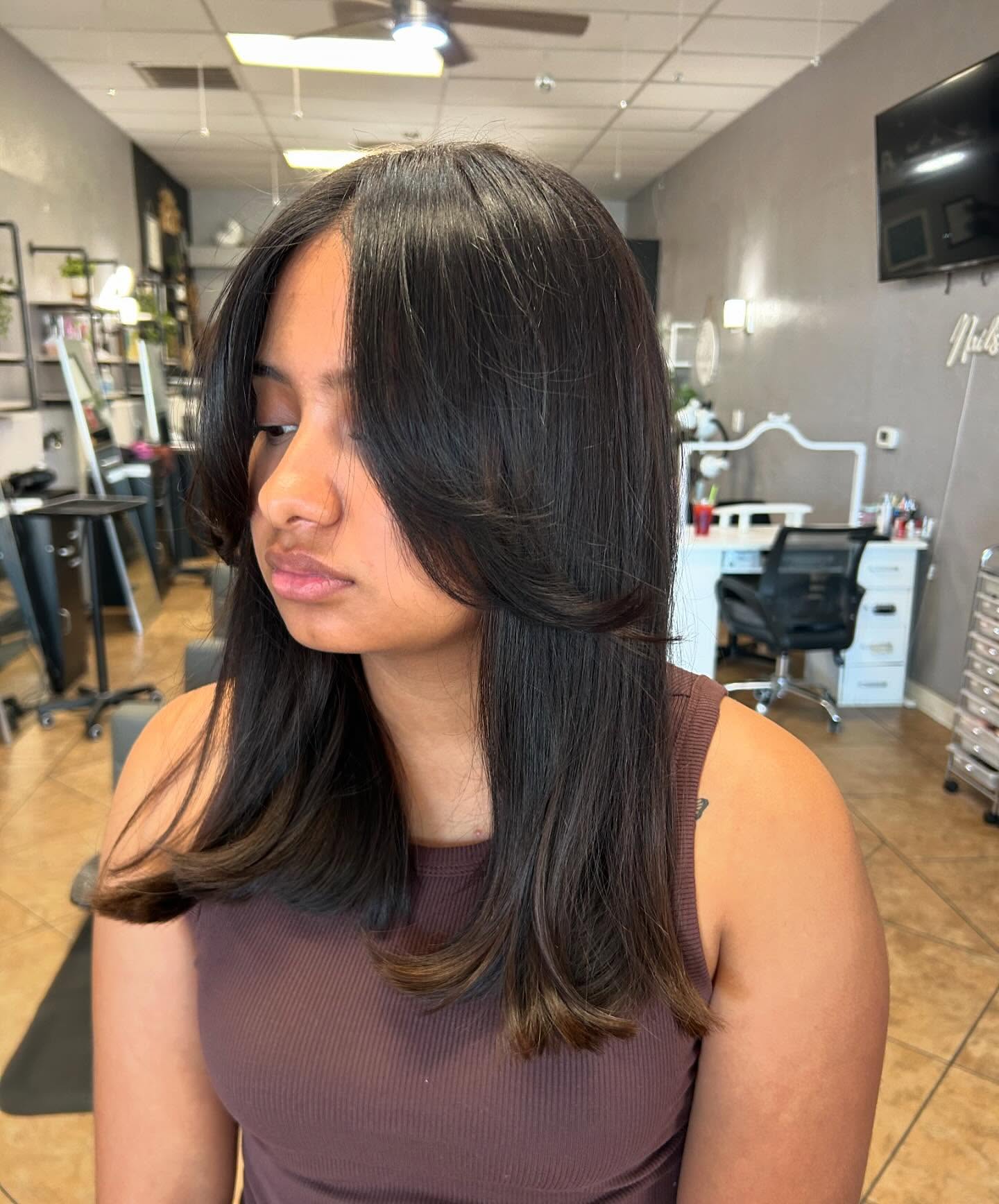 Chic Long Layered Cut with Soft Face-Framing Layers