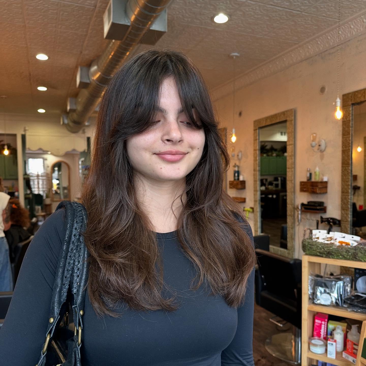 Chic Textured Long Cut with Soft Curtain Bangs