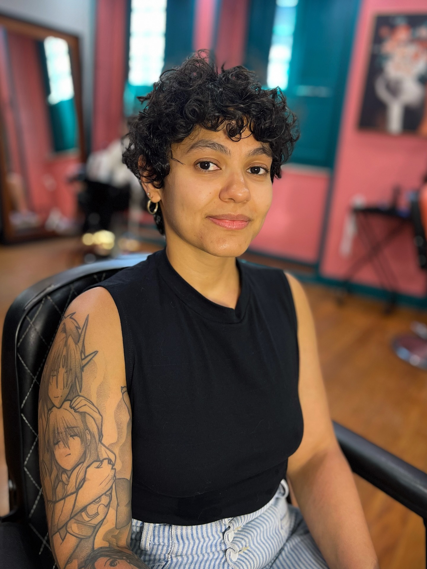 Playful Curly Pixie with Voluminous Top