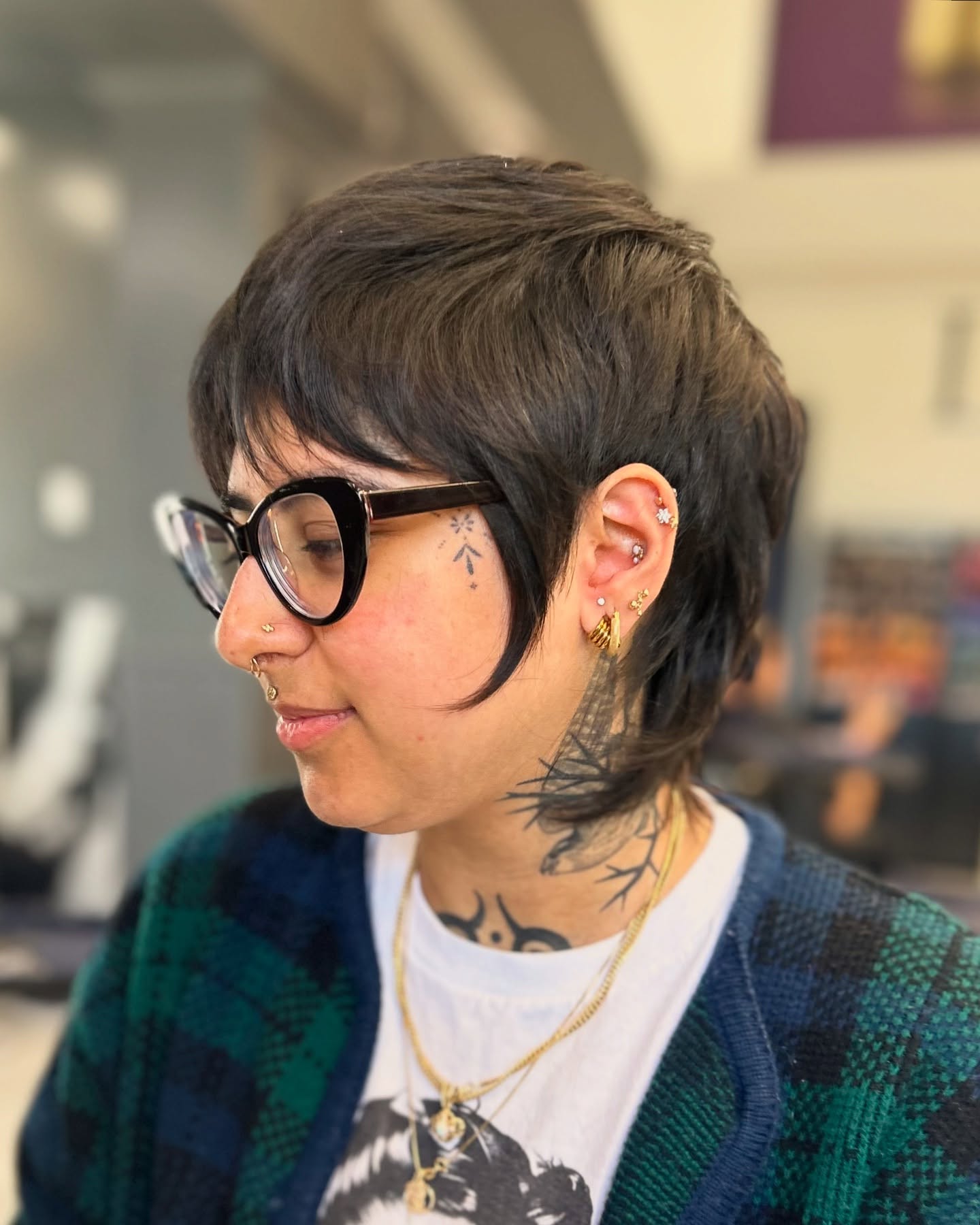 Trendy Textured Pixie Mullet with Side-Swept Layers