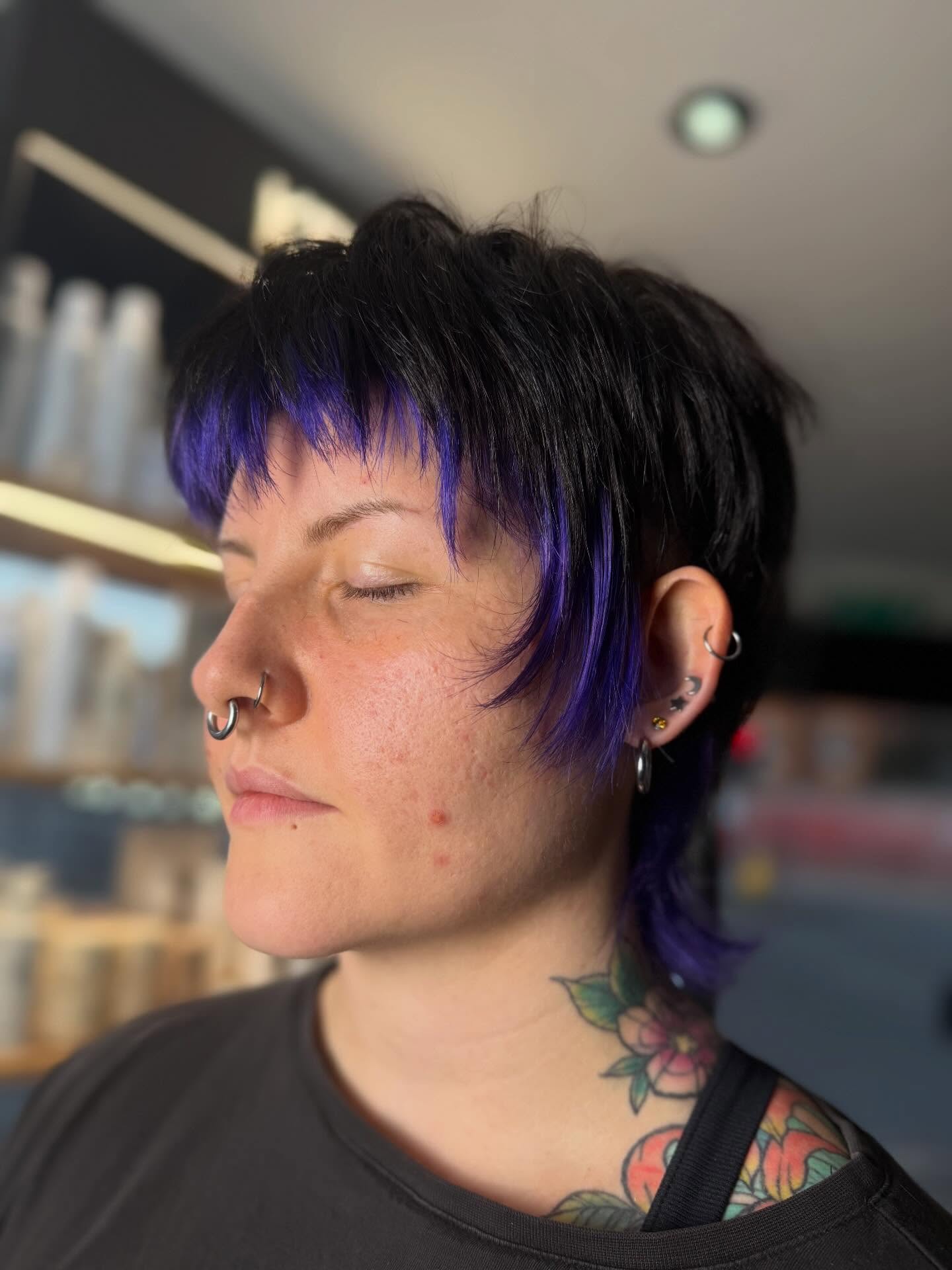 Vibrant Black and Purple Textured Pixie Cut
