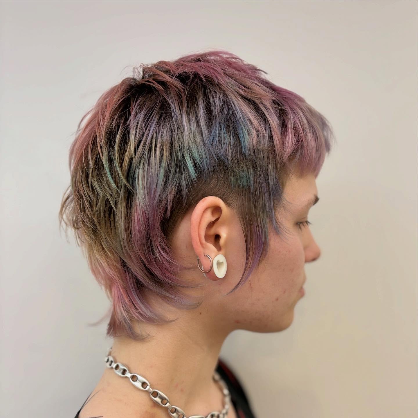 Whimsical Pastel Pixie Mullet with Textured Layers