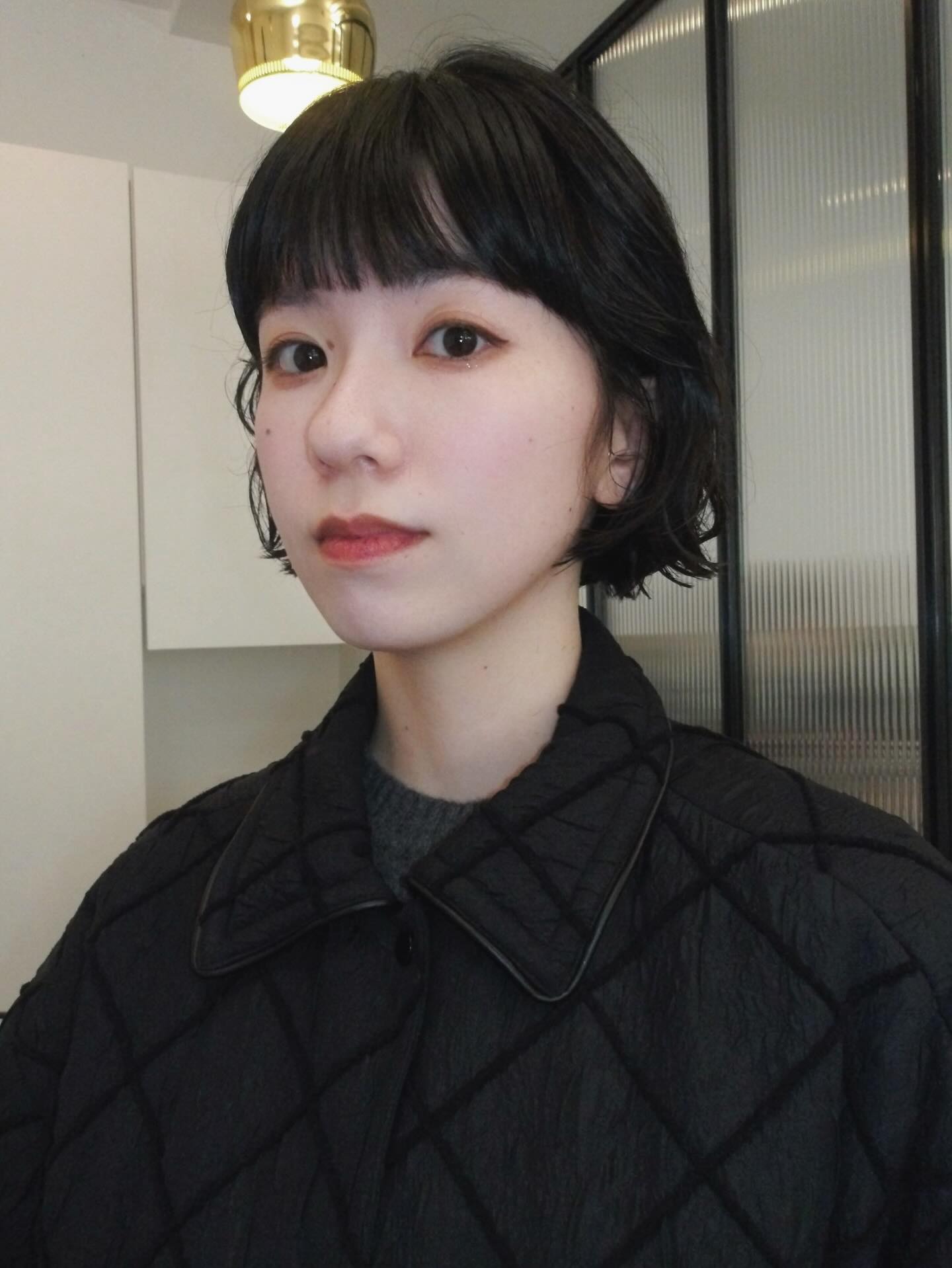 Chic Jet-Black Bob with Curled Ends