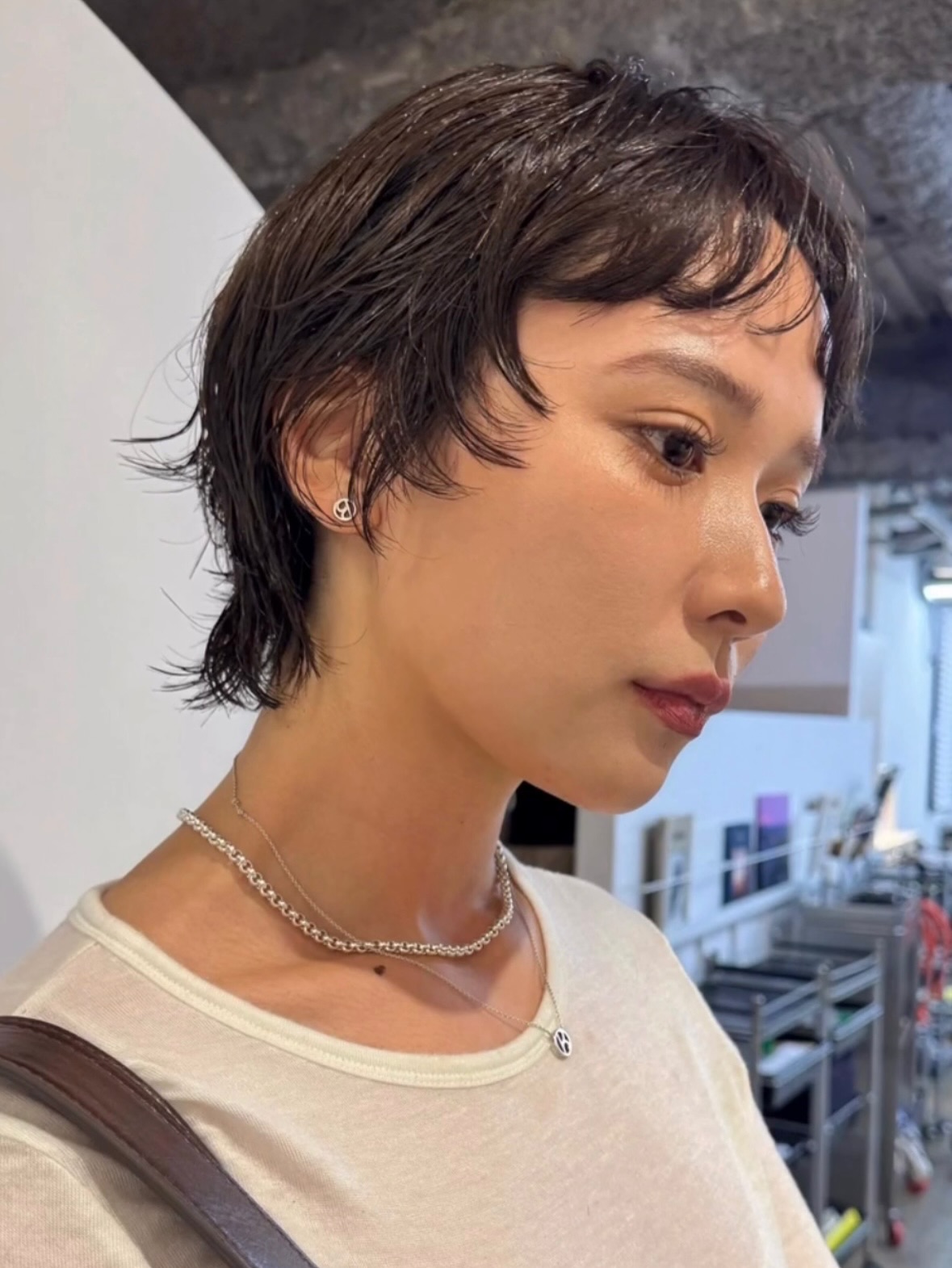 Elegant Dark Tousled Bob with Disconnected Undercut