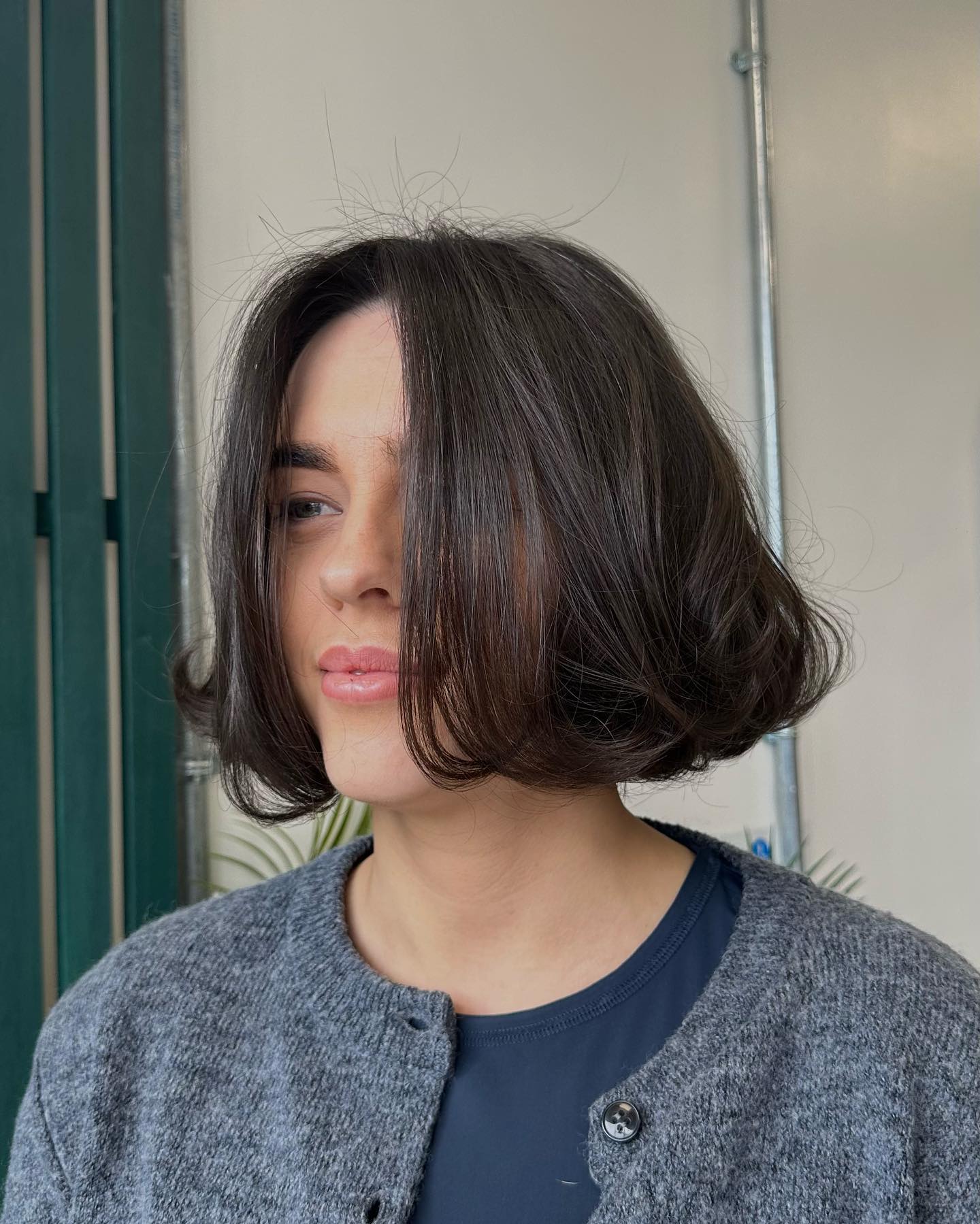 Modern Curly Bob with Face-Softening Layers