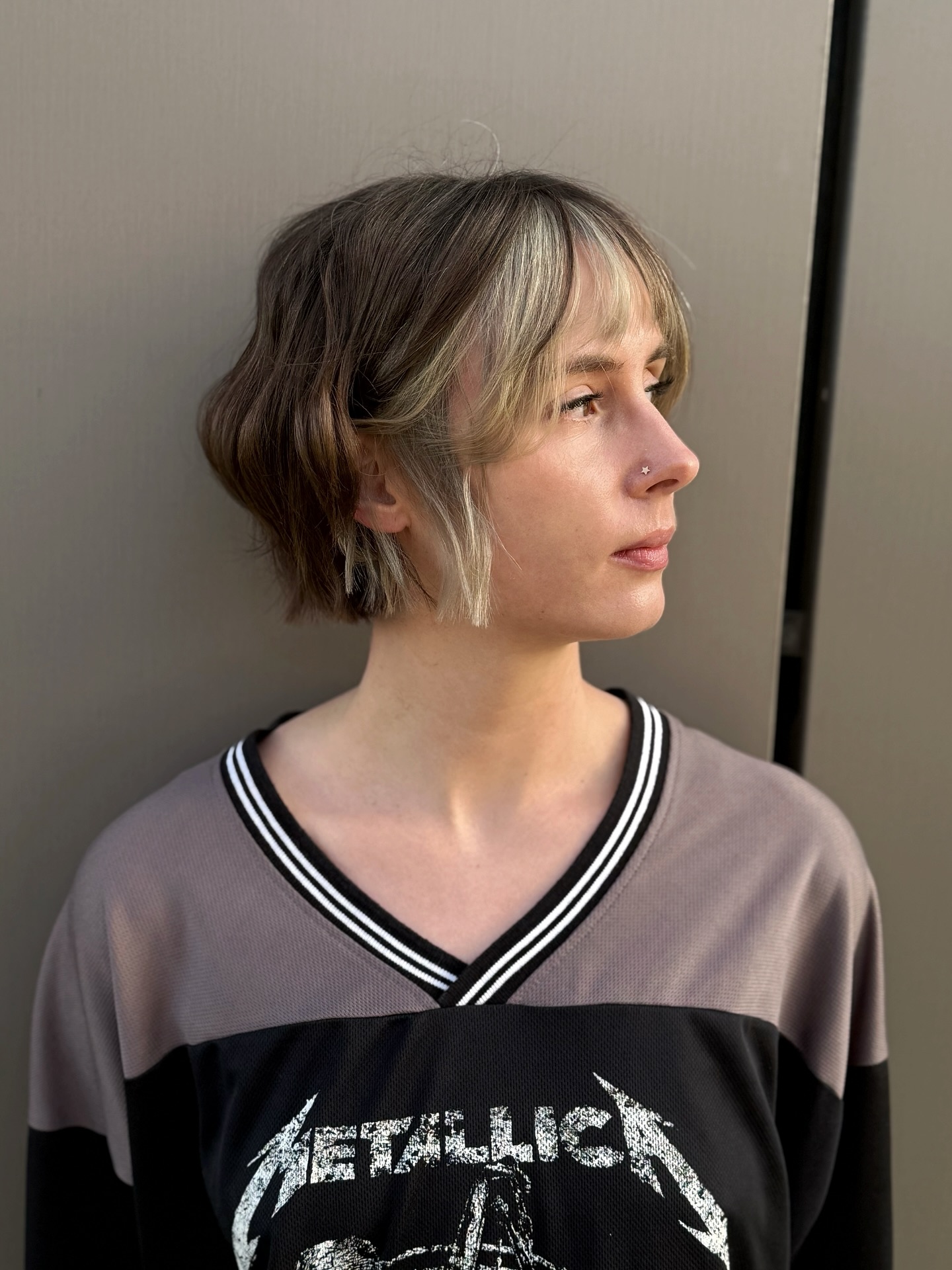 Subtle Ash Blonde Graduated Bob with Soft Fringe